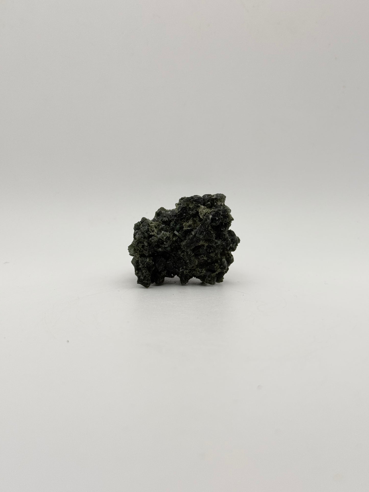 Raw prehnite specimen with amazing green color.