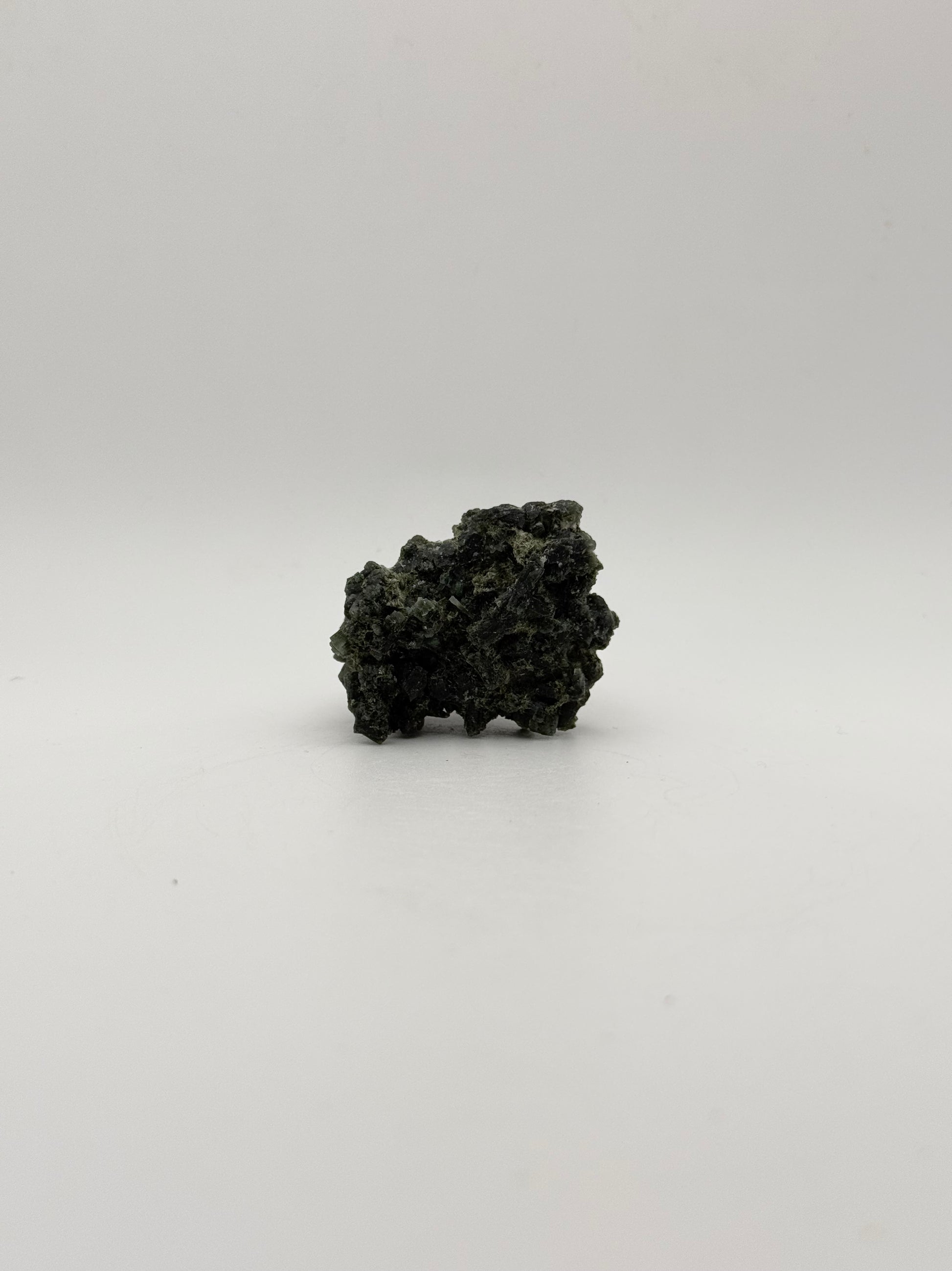 Raw prehnite specimen with amazing green color.