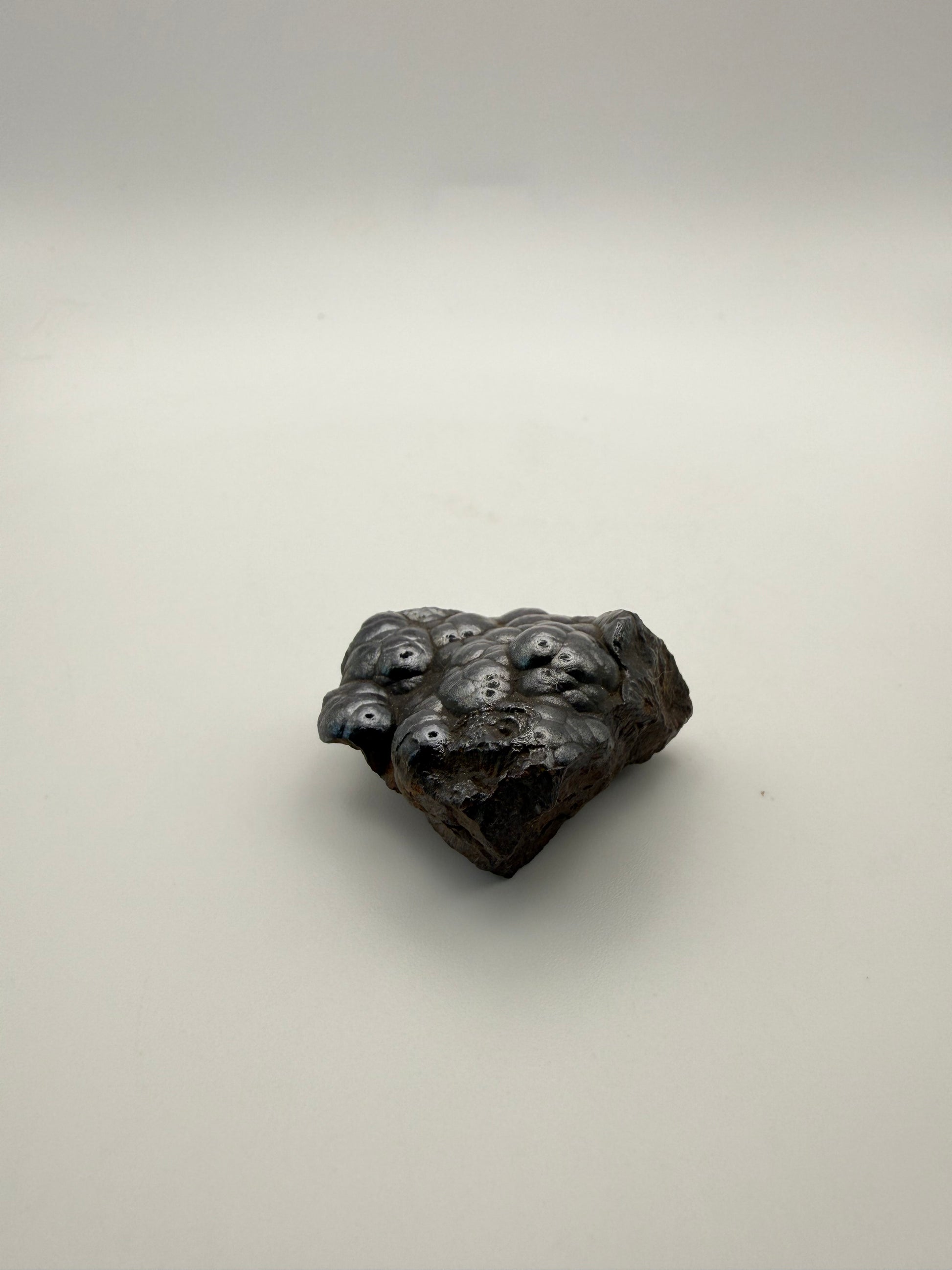 Small raw hematite specimen.