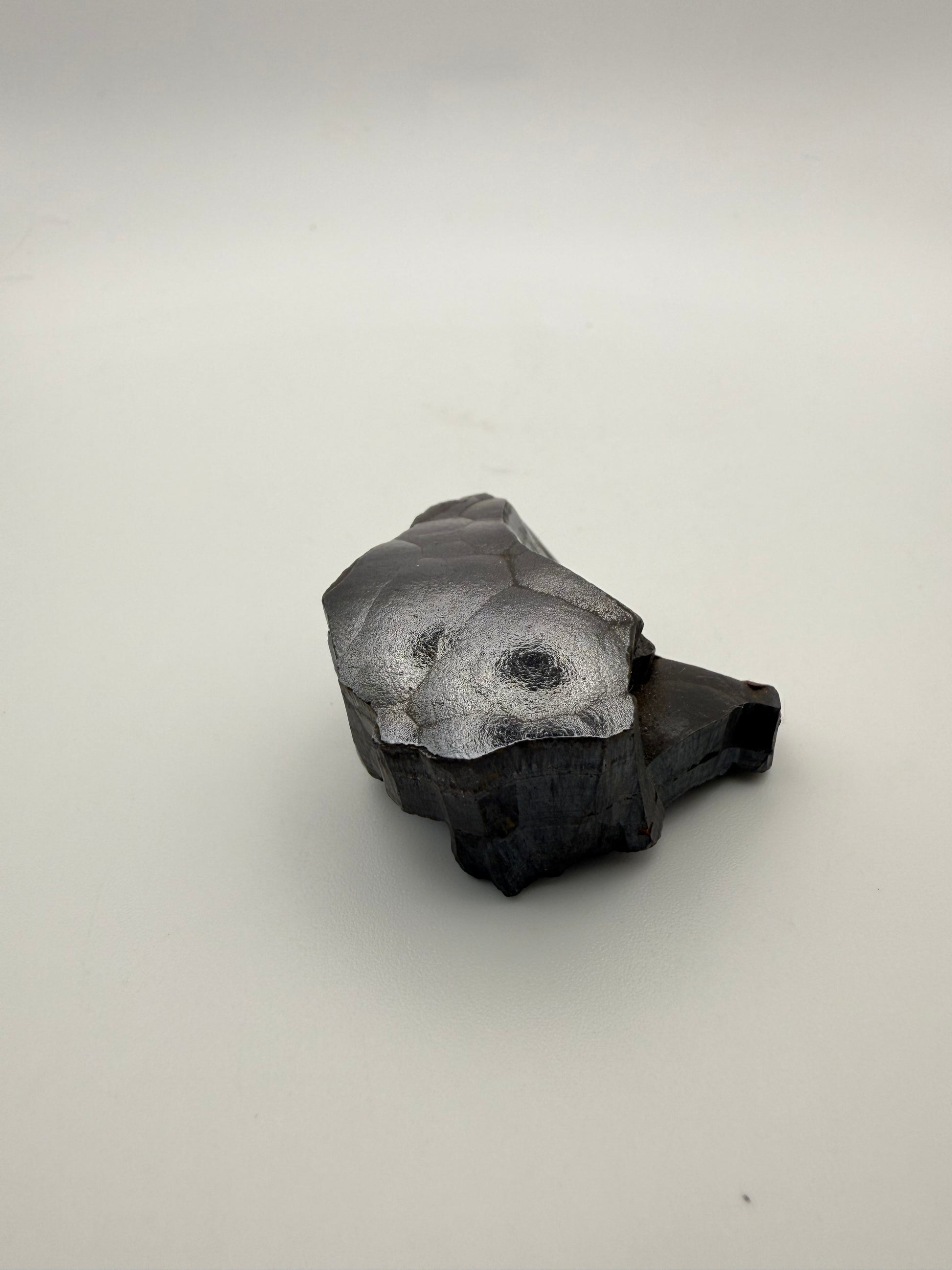 Small raw hematite specimen.