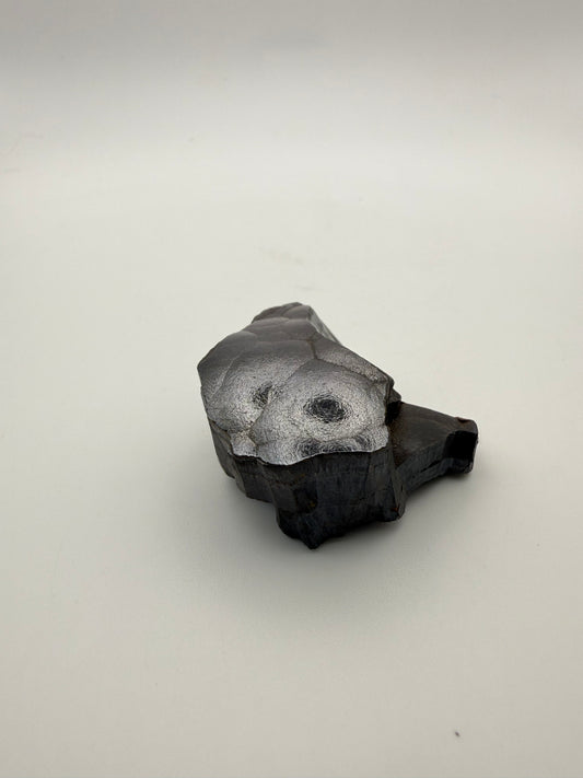 Small raw hematite specimen.
