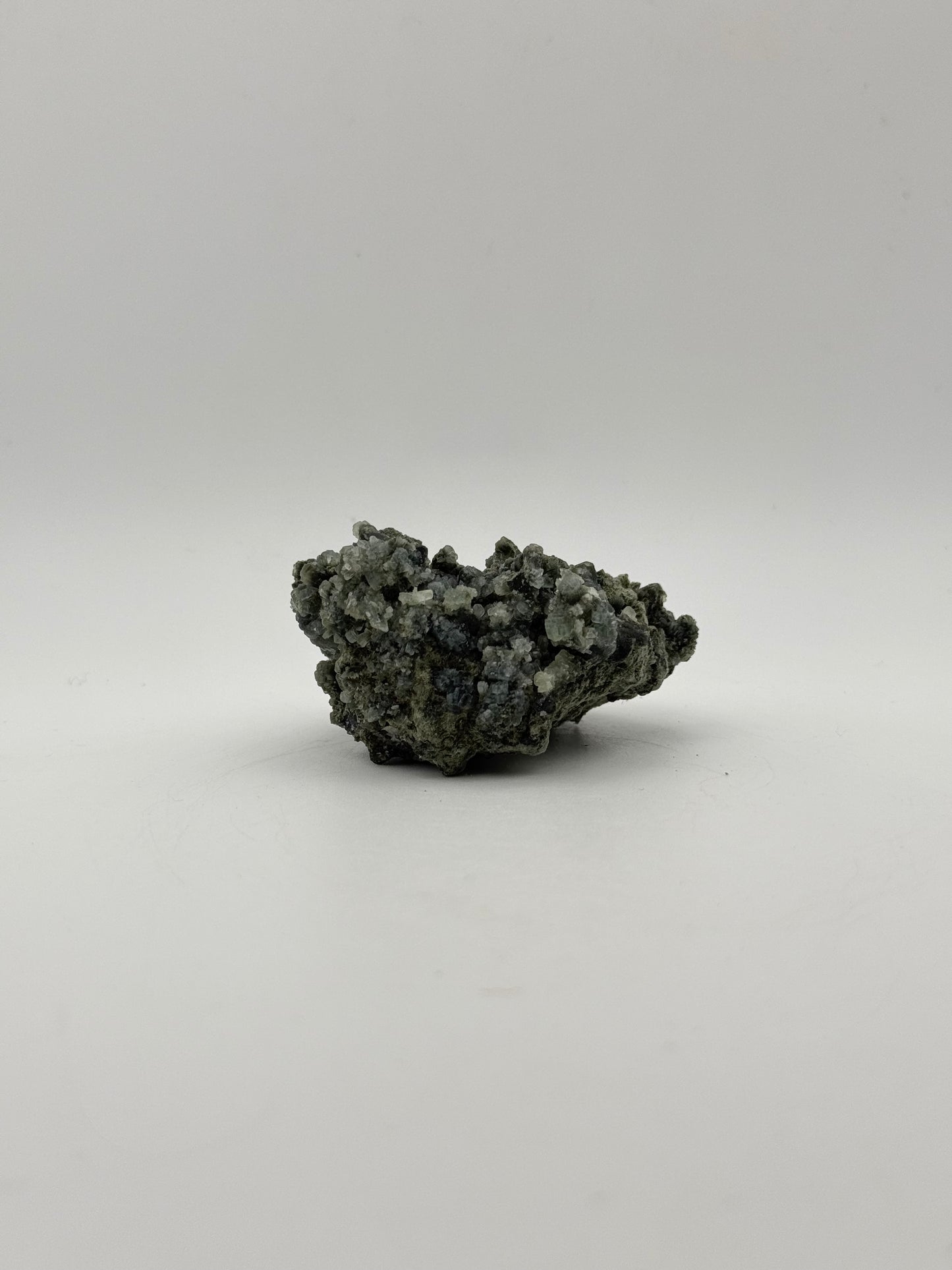 Raw prehnite specimen with amazing green color.