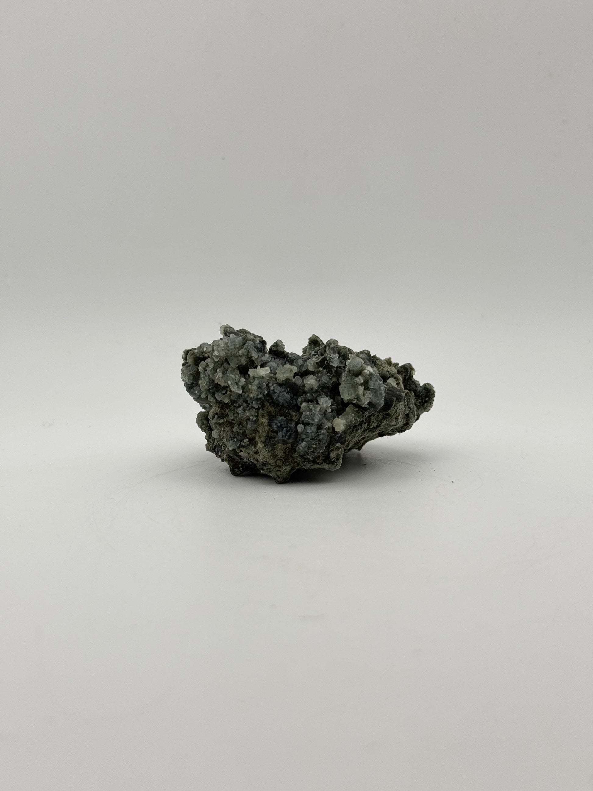 Raw prehnite specimen with amazing green color.