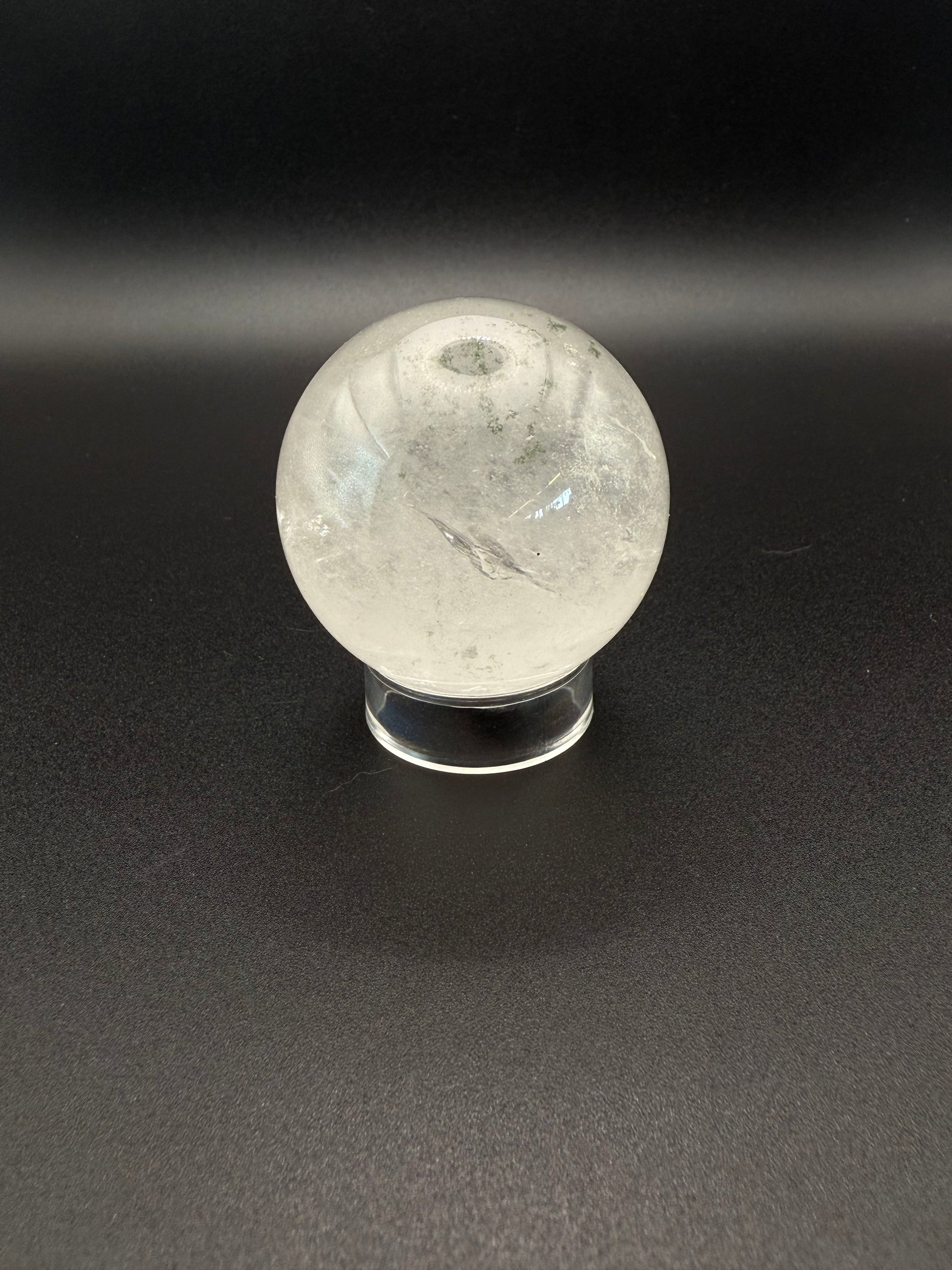 Clear quartz polished crystal sphere.
