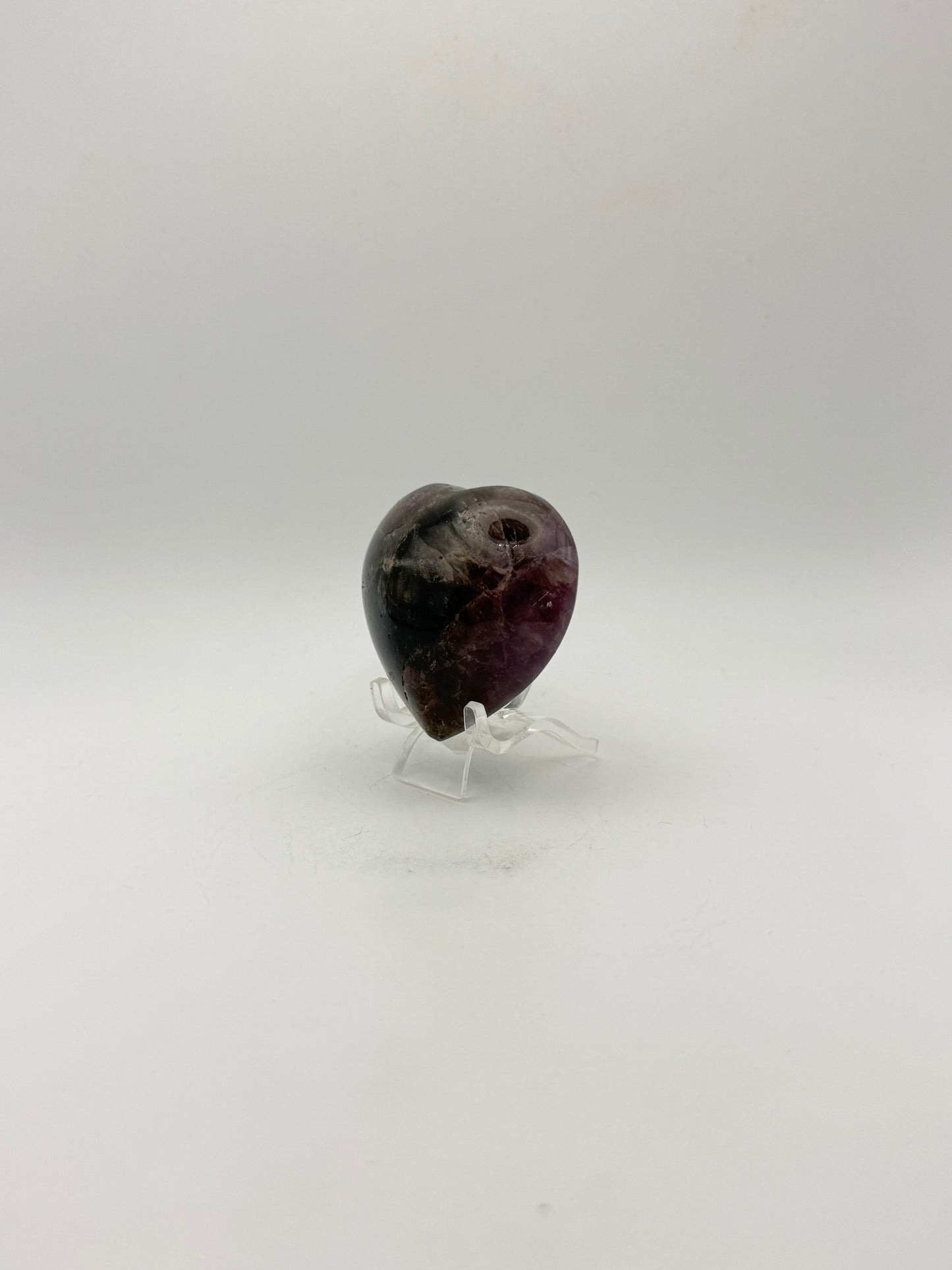 Polished super 7 in the shape of a heart.