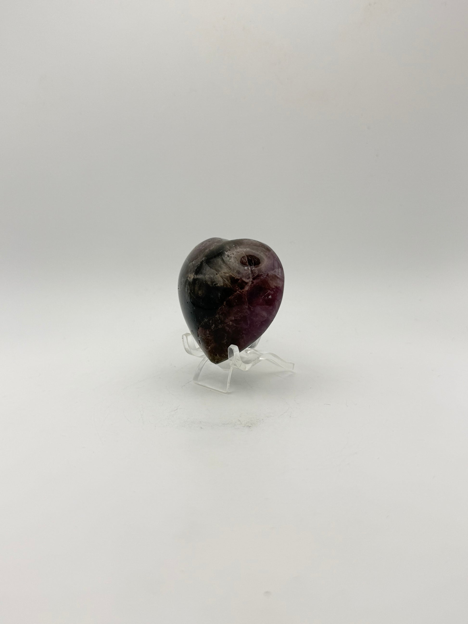 Polished super 7 in the shape of a heart.