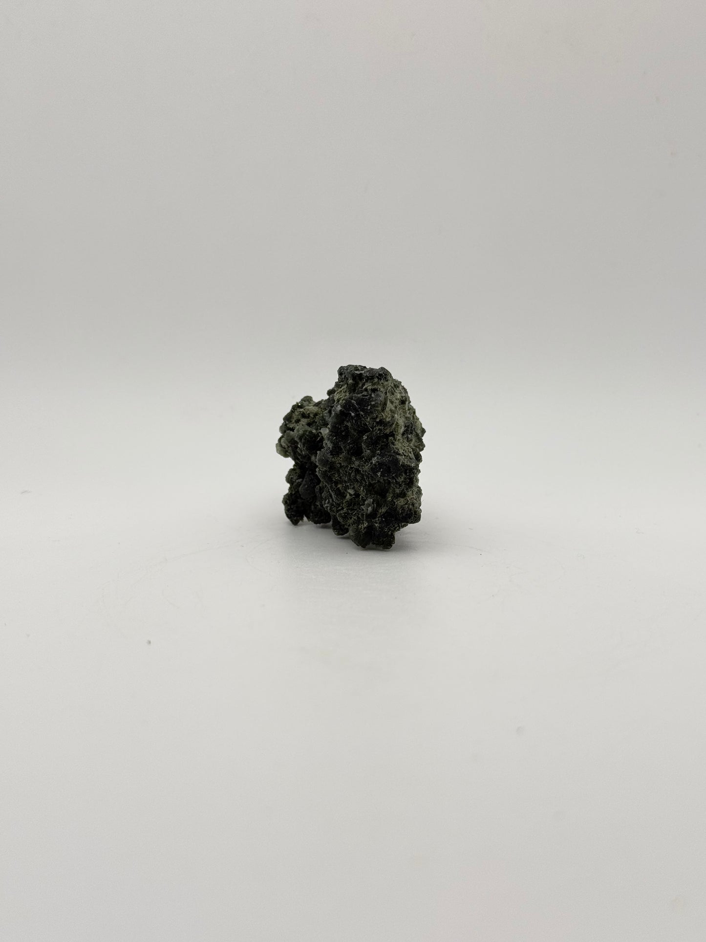 Raw prehnite specimen with amazing green color.