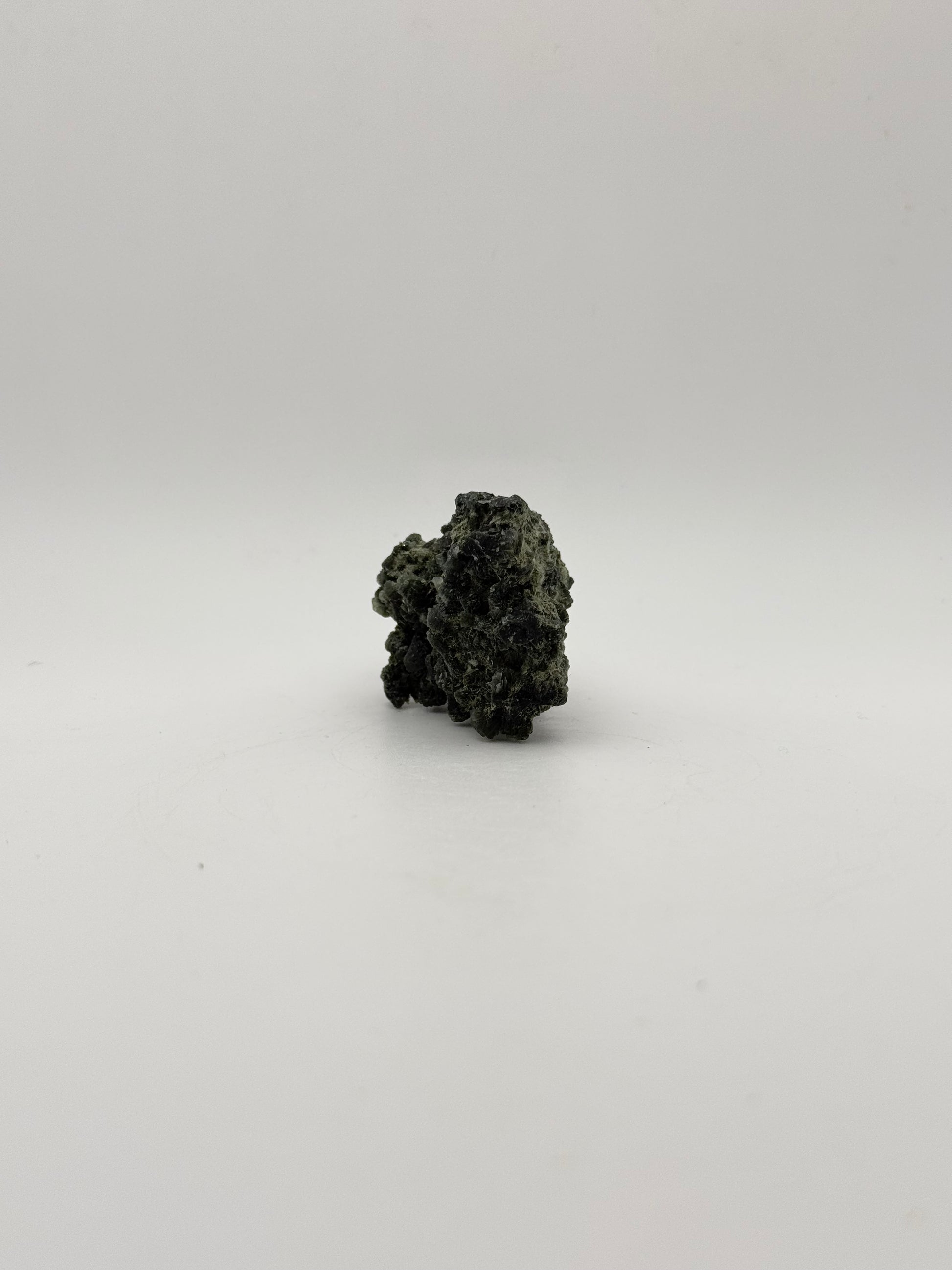 Raw prehnite specimen with amazing green color.