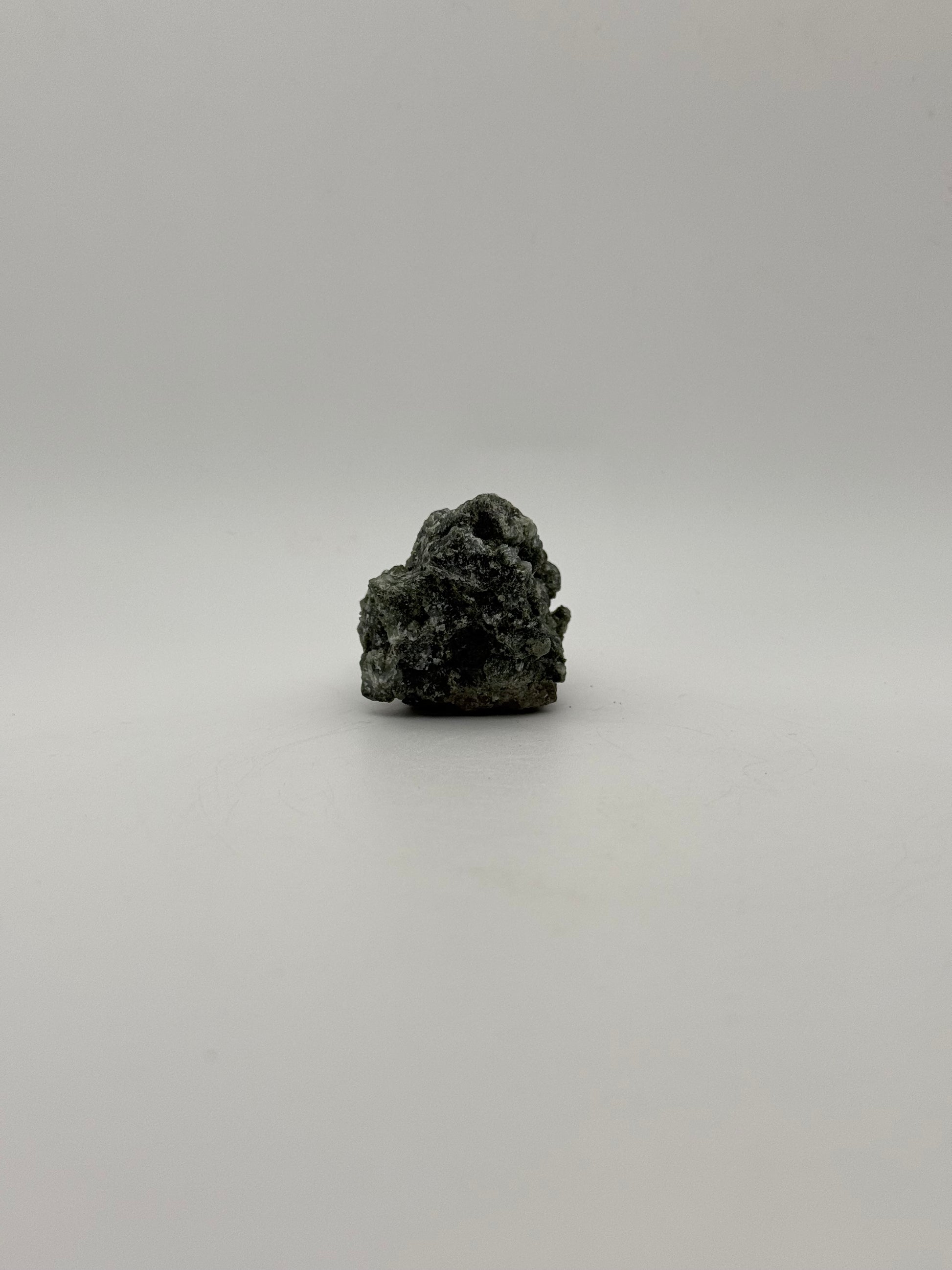 Raw prehnite specimen with amazing green color.