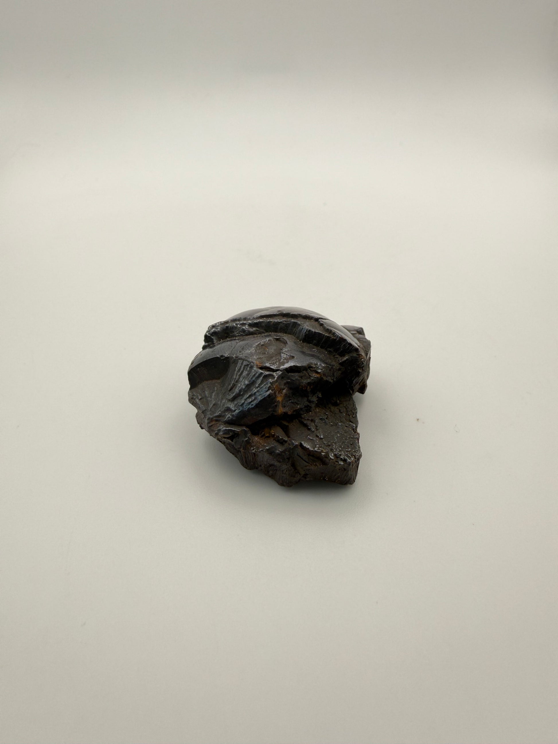 Small raw hematite specimen.