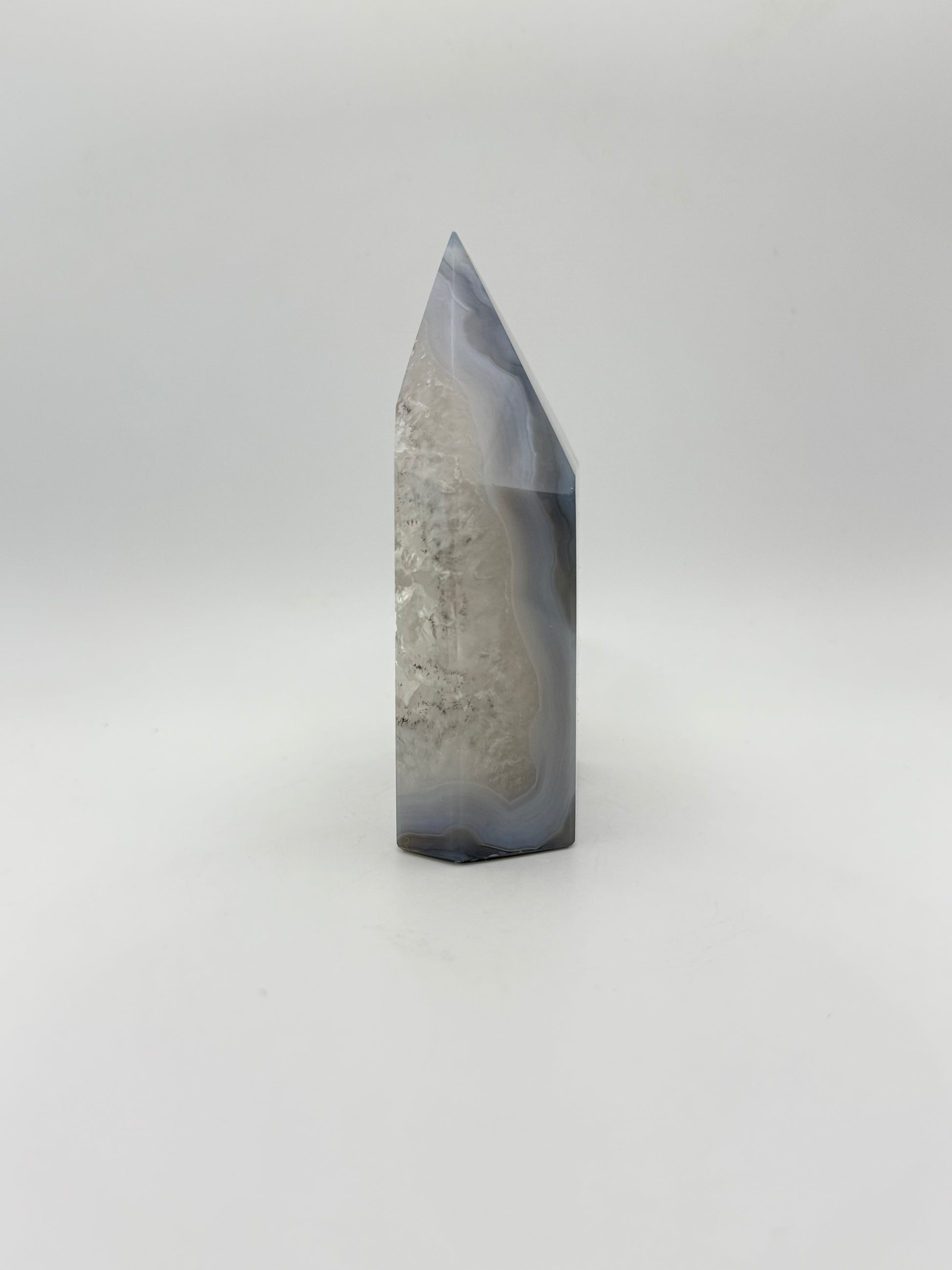 Polished druzy agate tower. a little over 4 inches tall.