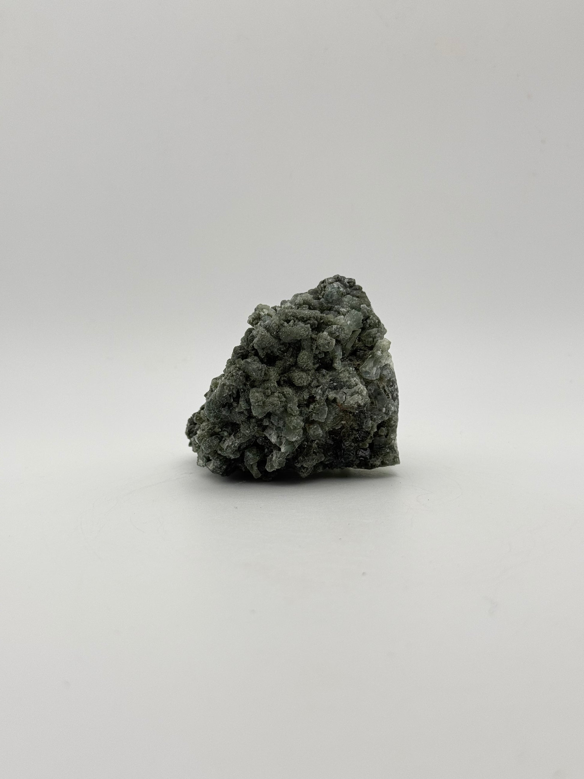 Raw prehnite specimen with amazing green color.