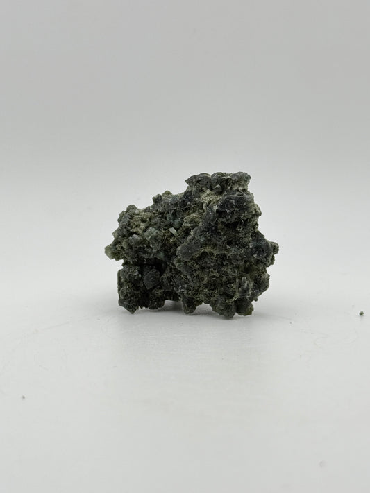 Raw prehnite specimen with amazing green color.