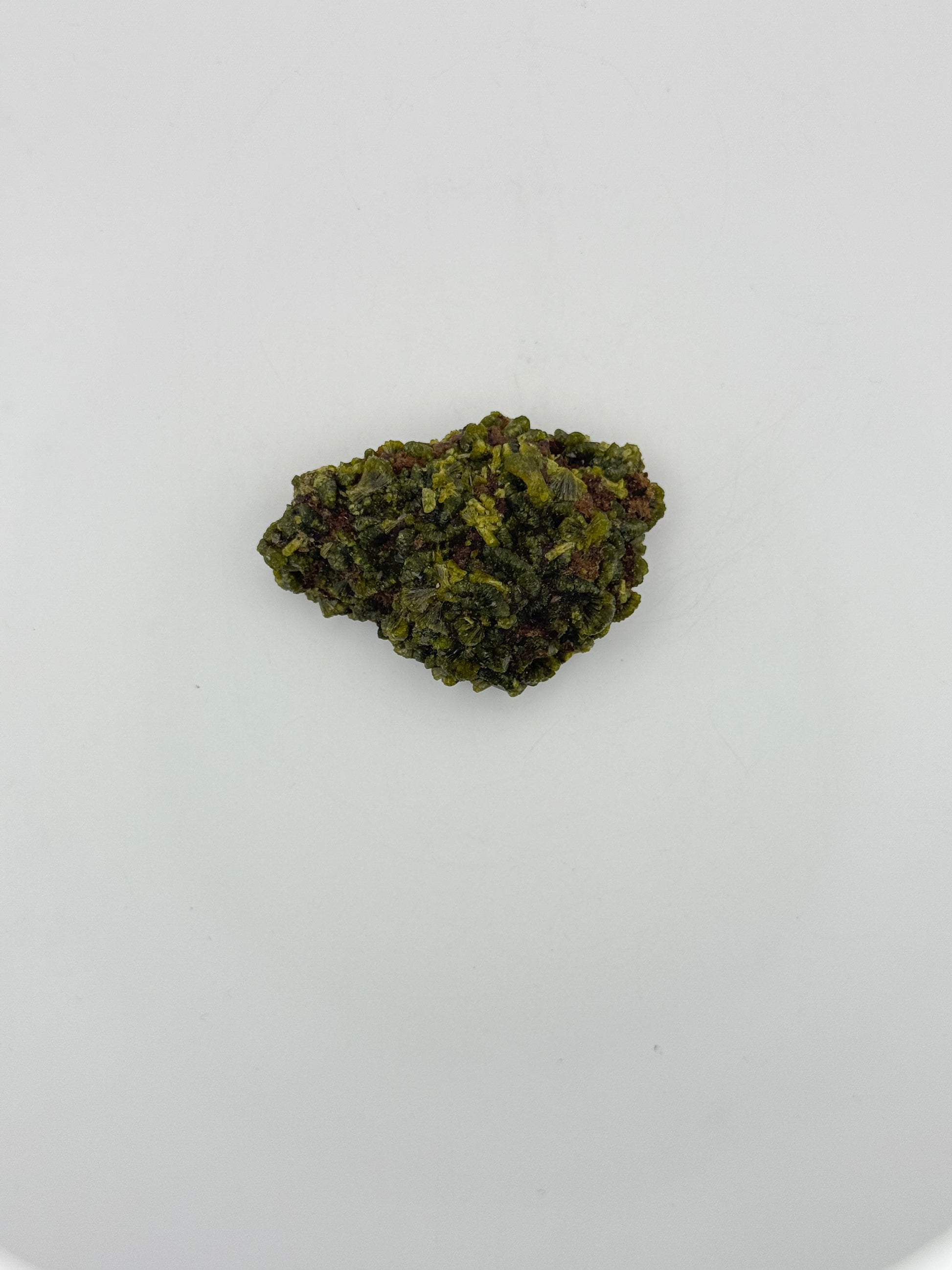 Epidote crystal cluster with good green color.