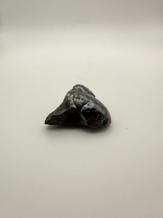 Small raw hematite specimen.