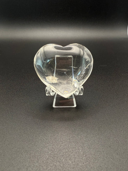 Clear quartz polished crystal heart.