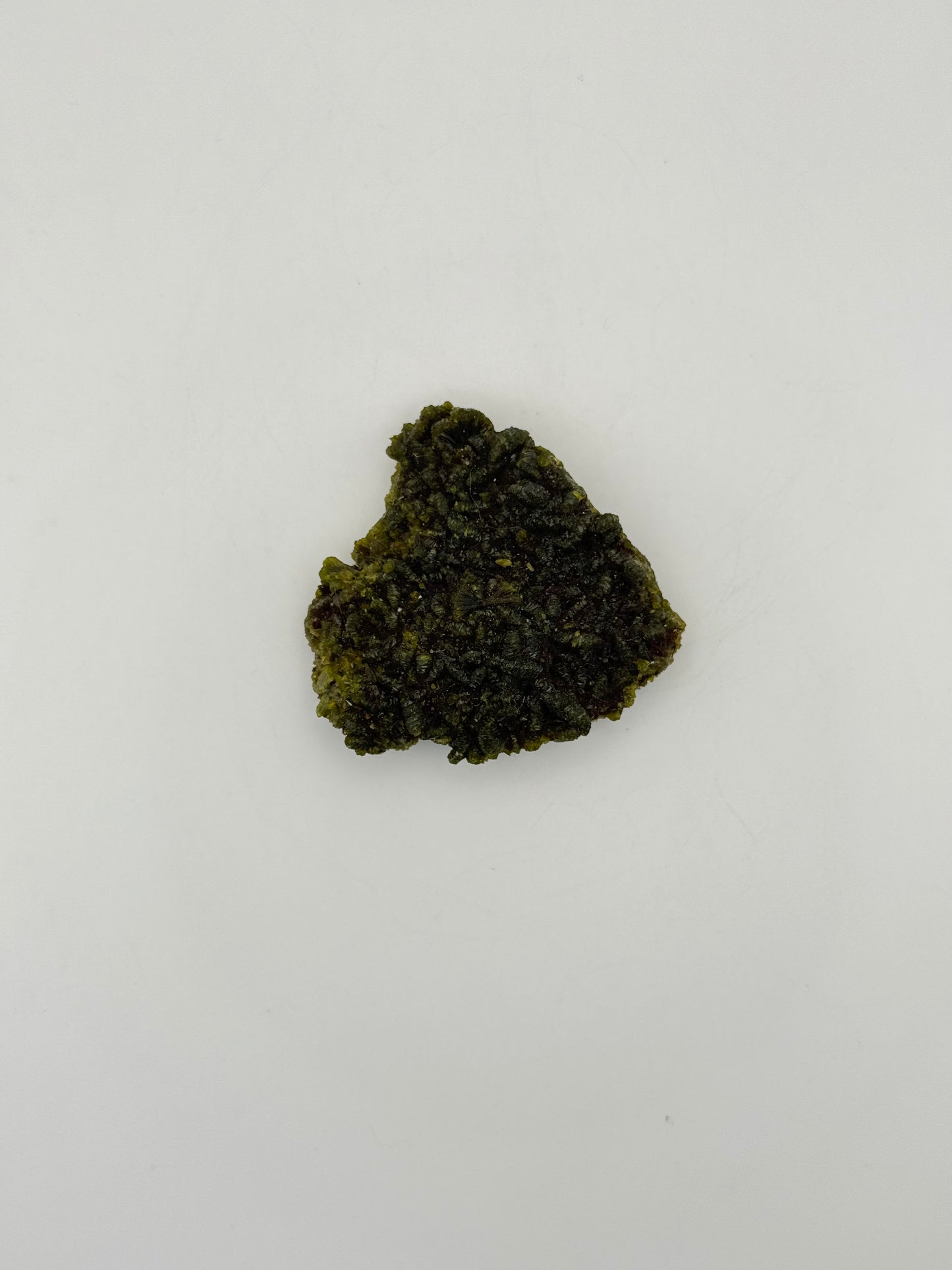 Epidote crystal cluster with good green color.