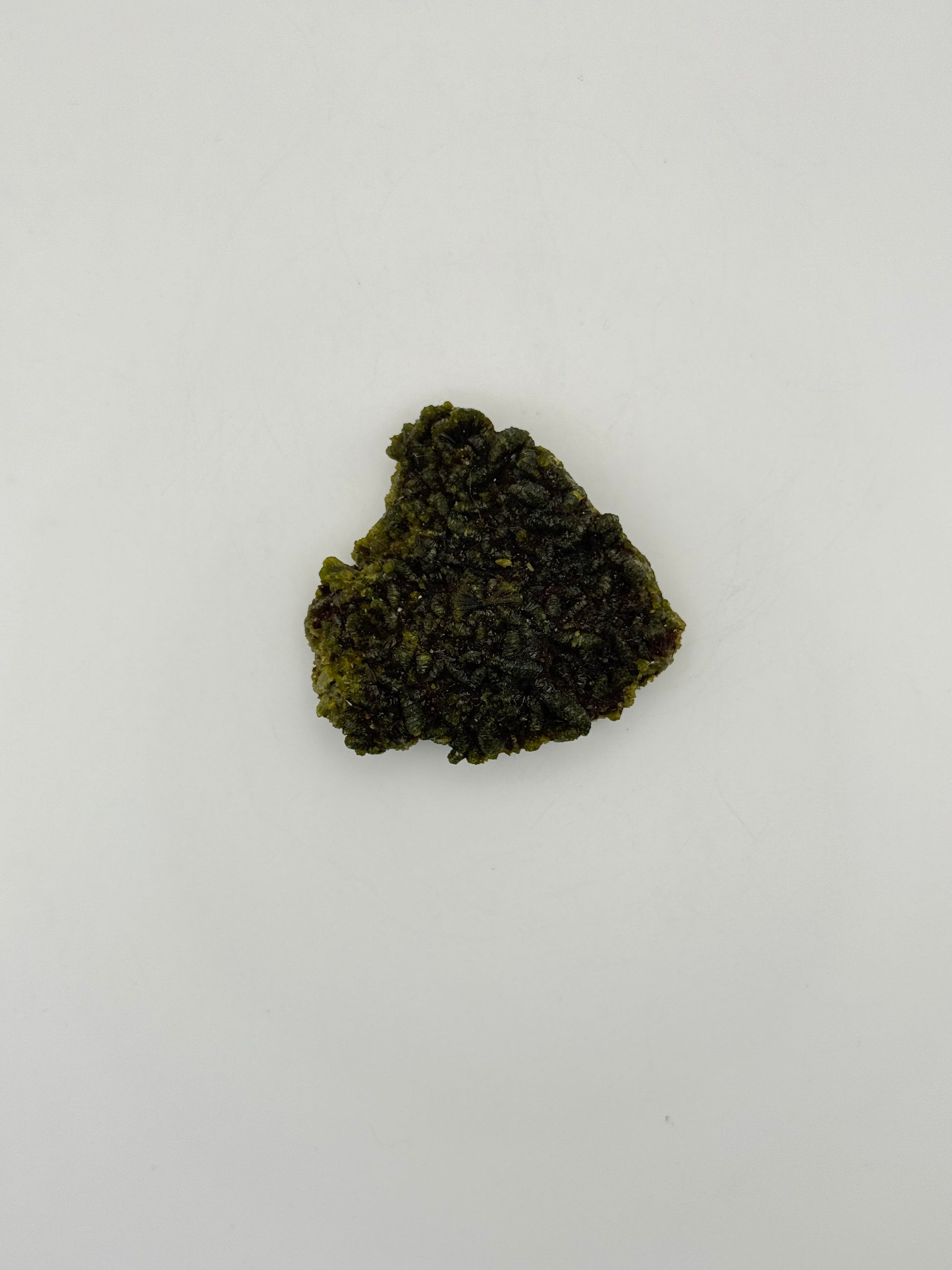 Epidote crystal cluster with good green color.