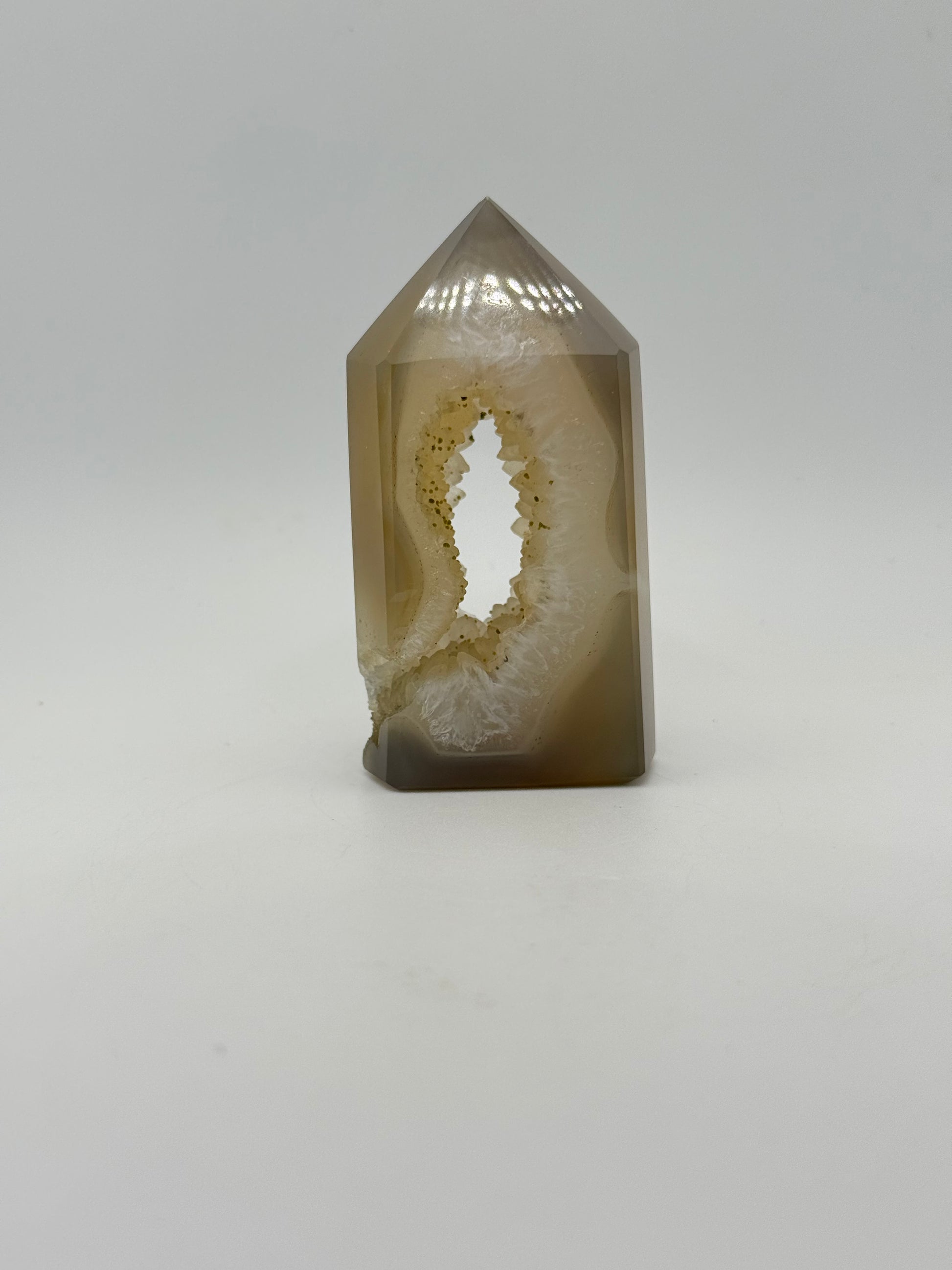 Polished druzy agate tower. About 3  inches tall.