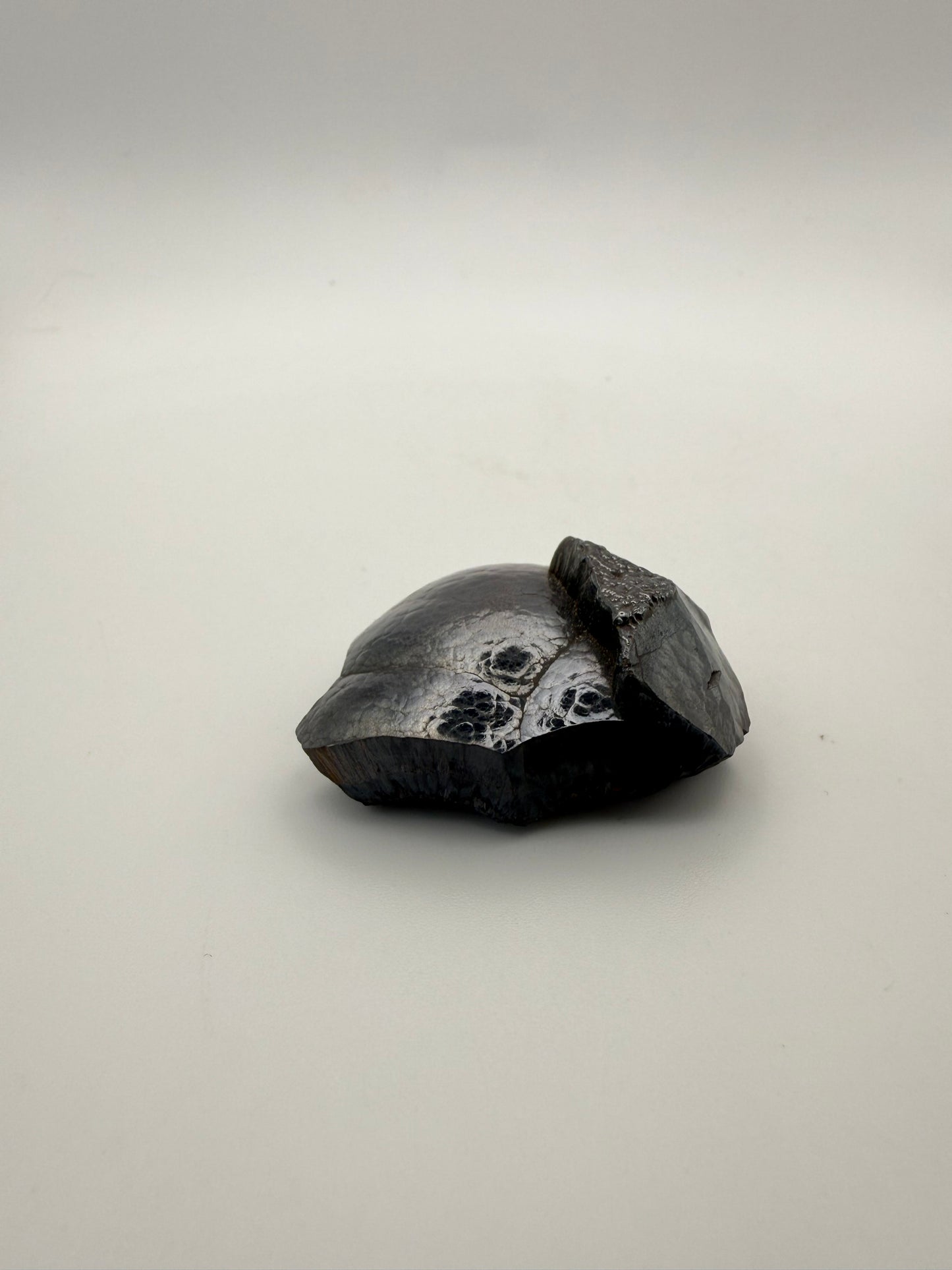 Small raw hematite specimen.