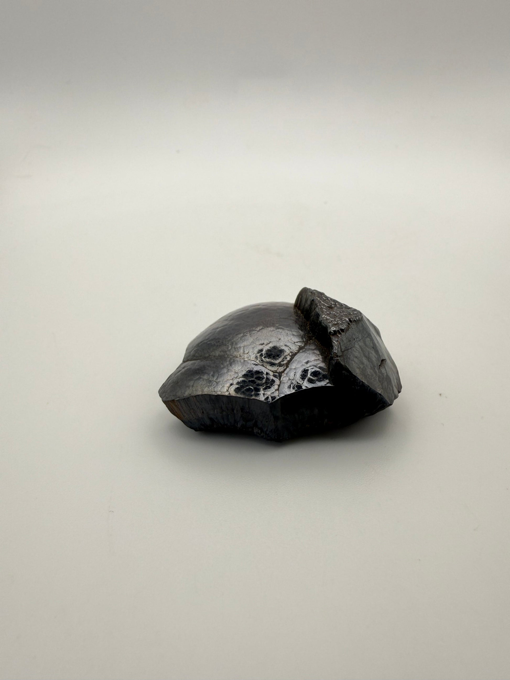 Small raw hematite specimen.