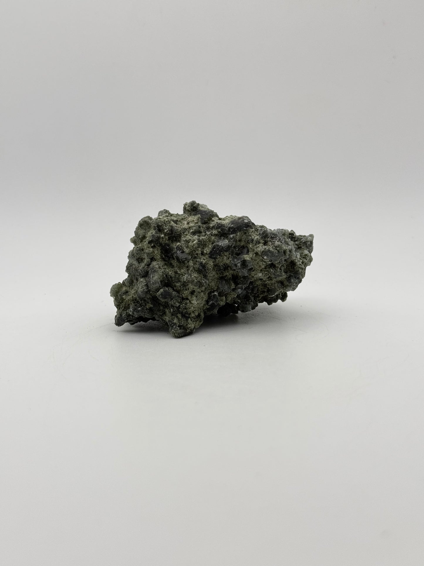 Raw prehnite specimen with amazing green color.