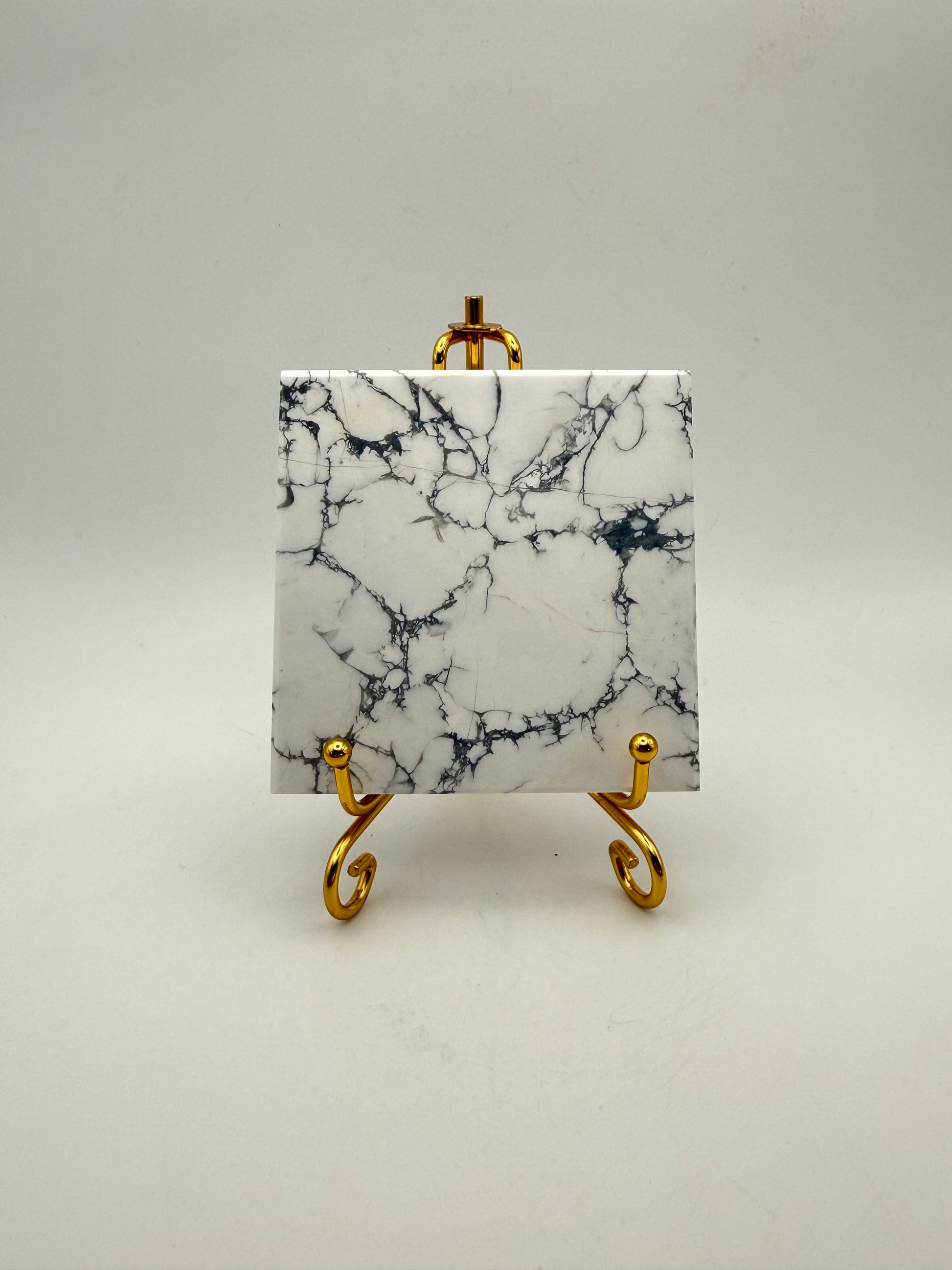 Polished howlite square tile.