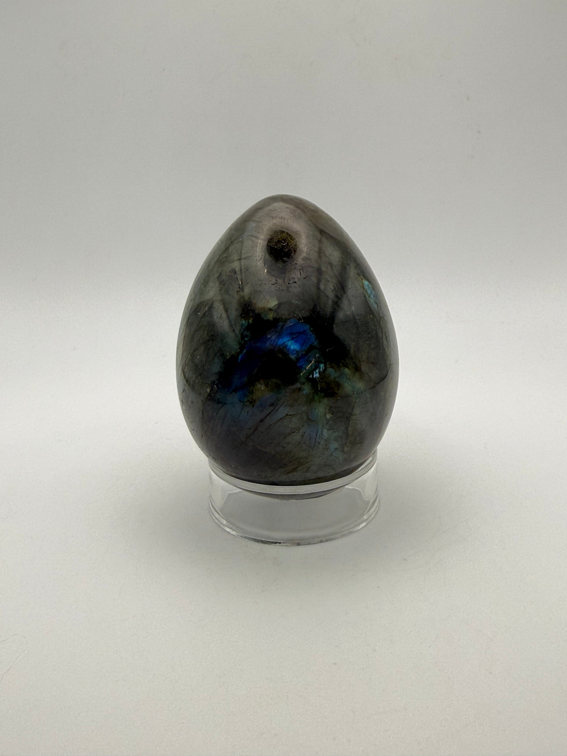 Labradorite polished stone in the shape of an egg.
