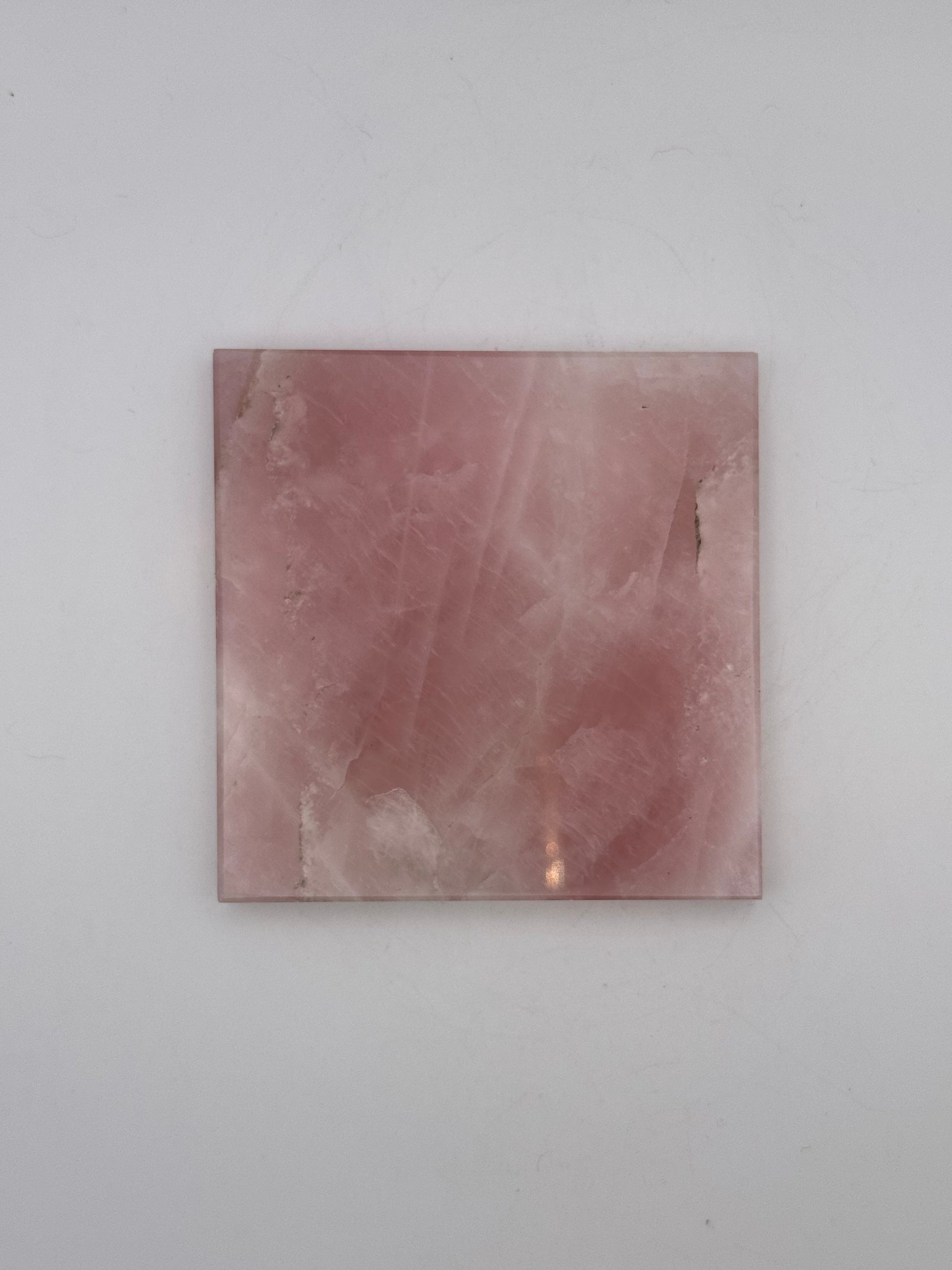 Polished rose quartz tile.