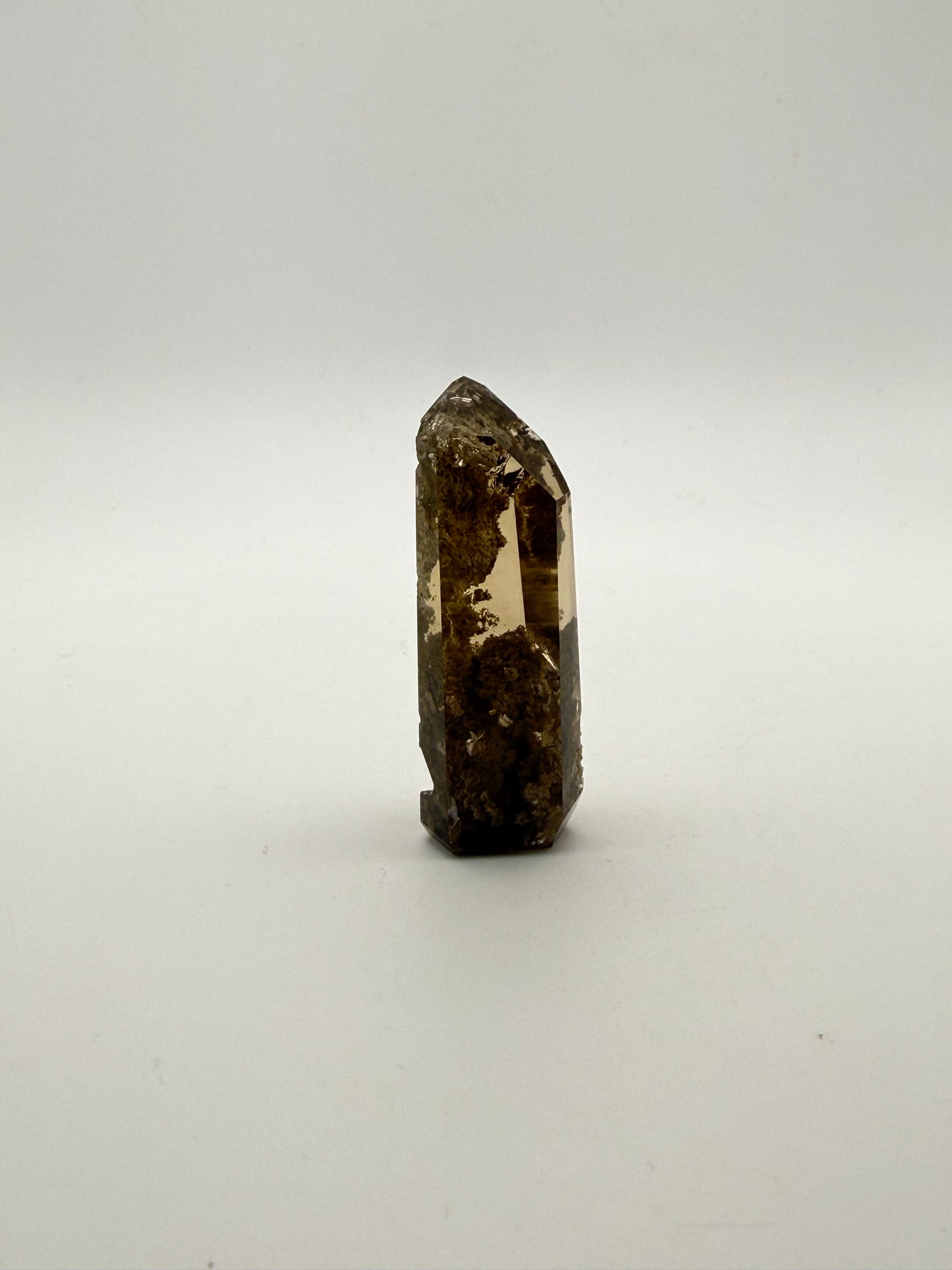 Polished natural citrine point.