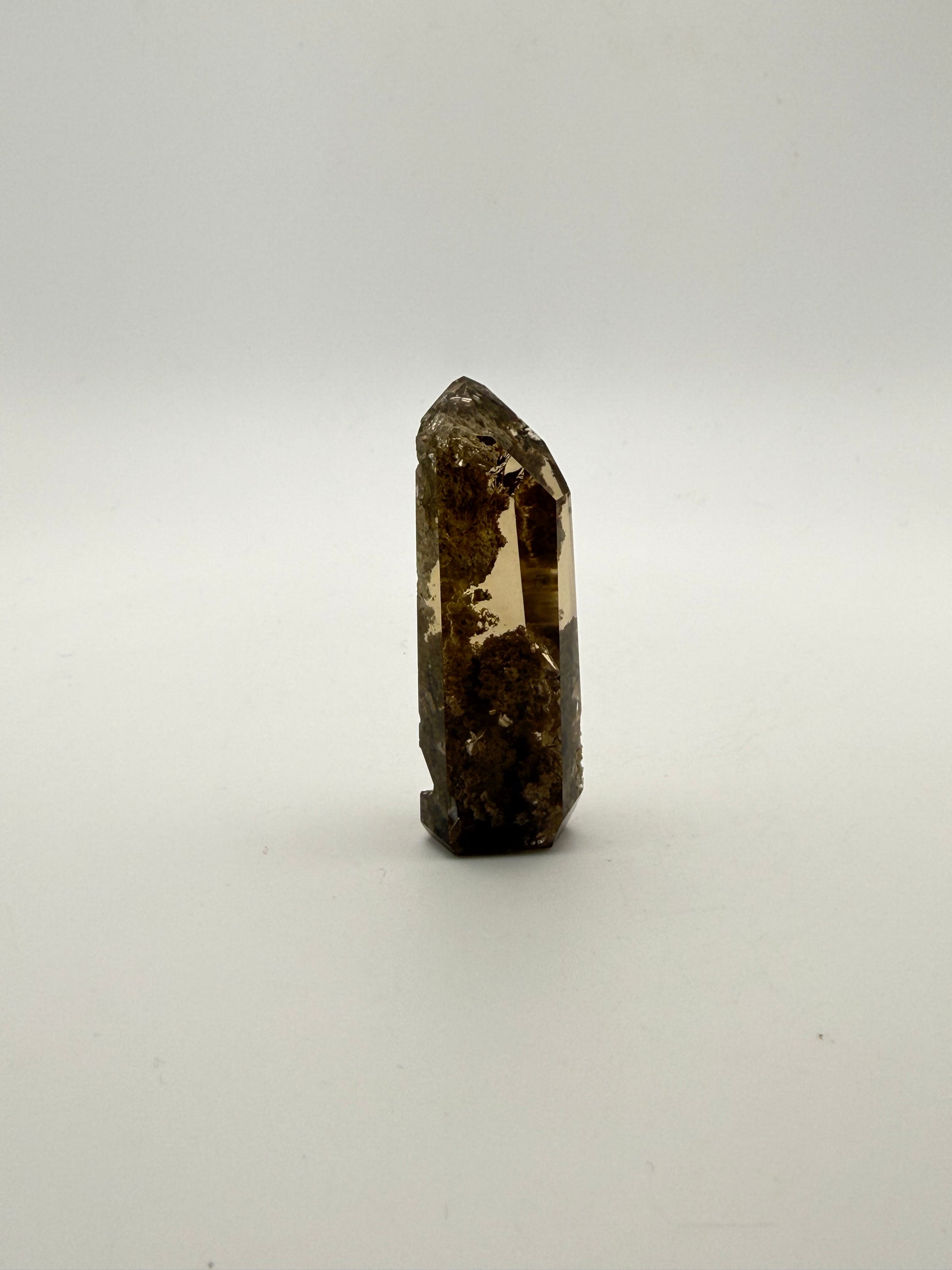 Polished natural citrine point.