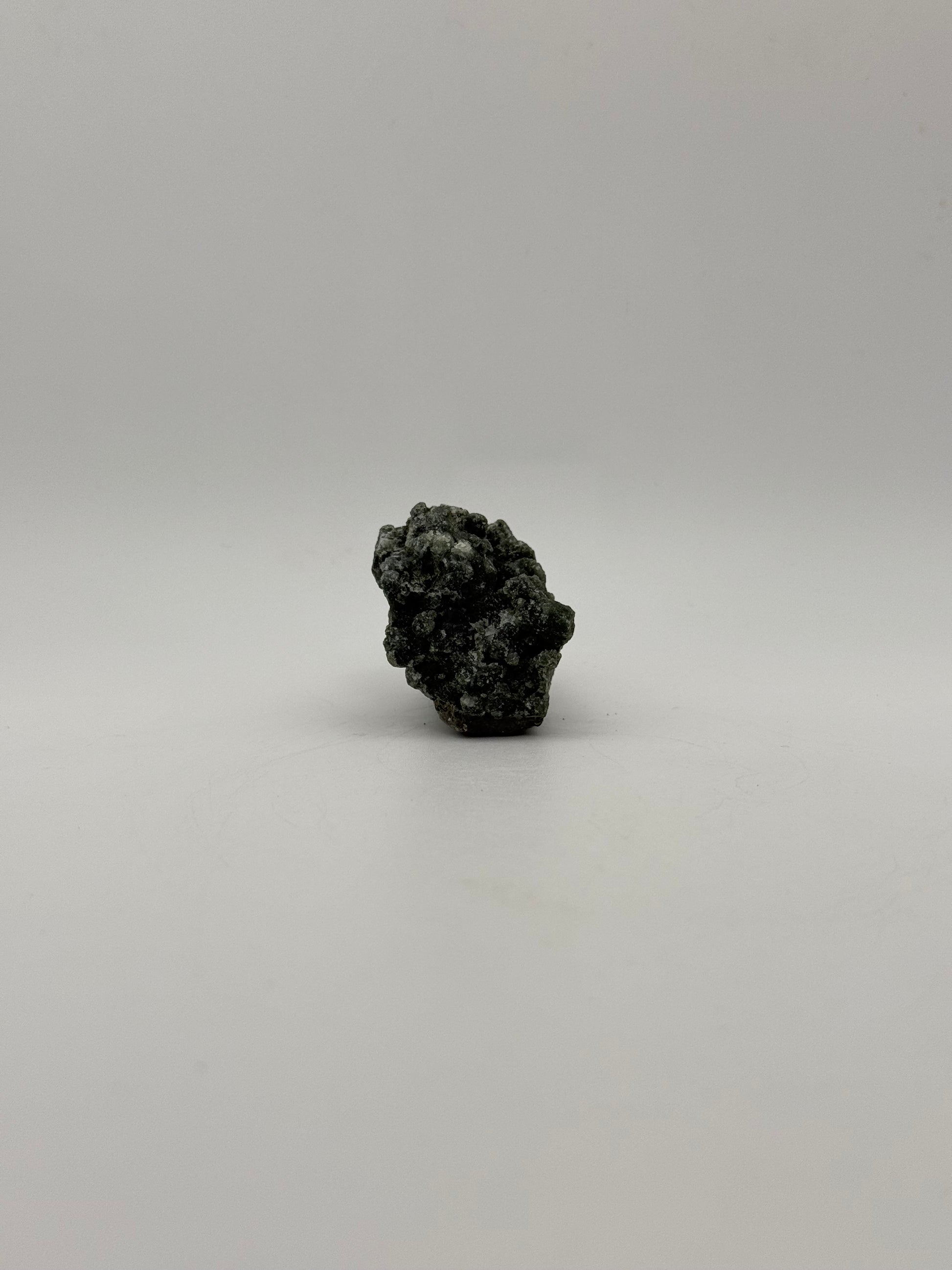 Raw prehnite specimen with amazing green color.