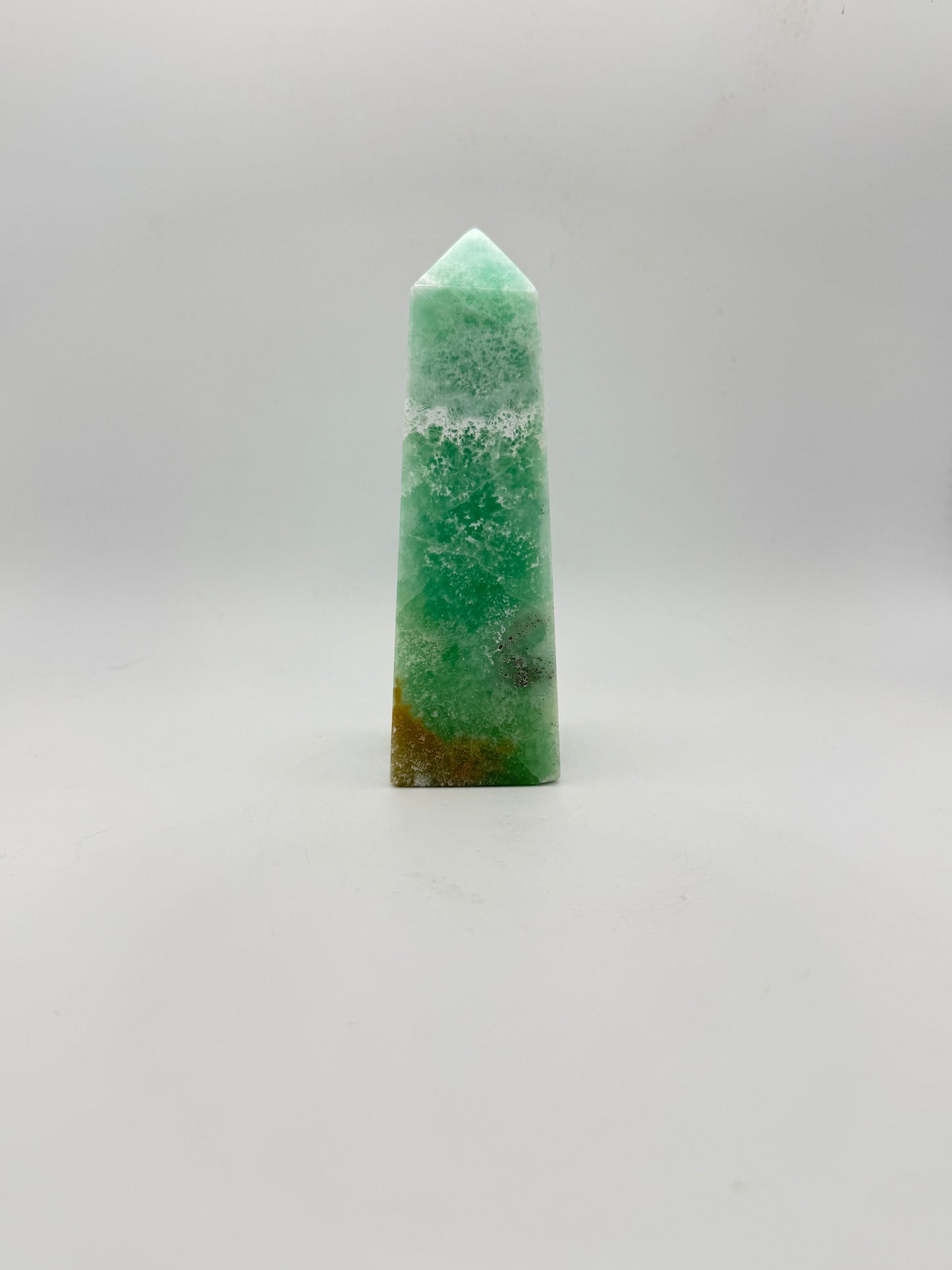 Caribbean Calcite polished four sided tower. This is 4.75 inches tall.
