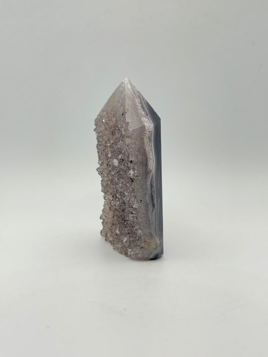 Polished druzy agate tower. About 3.25  inches tall.