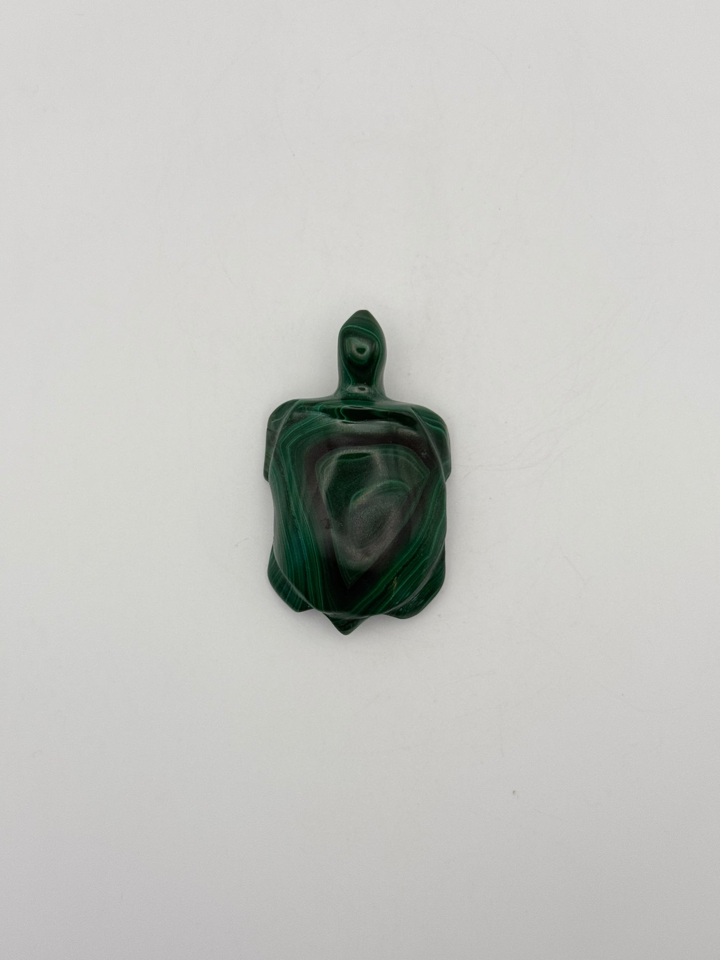 Malachite turtle carving.