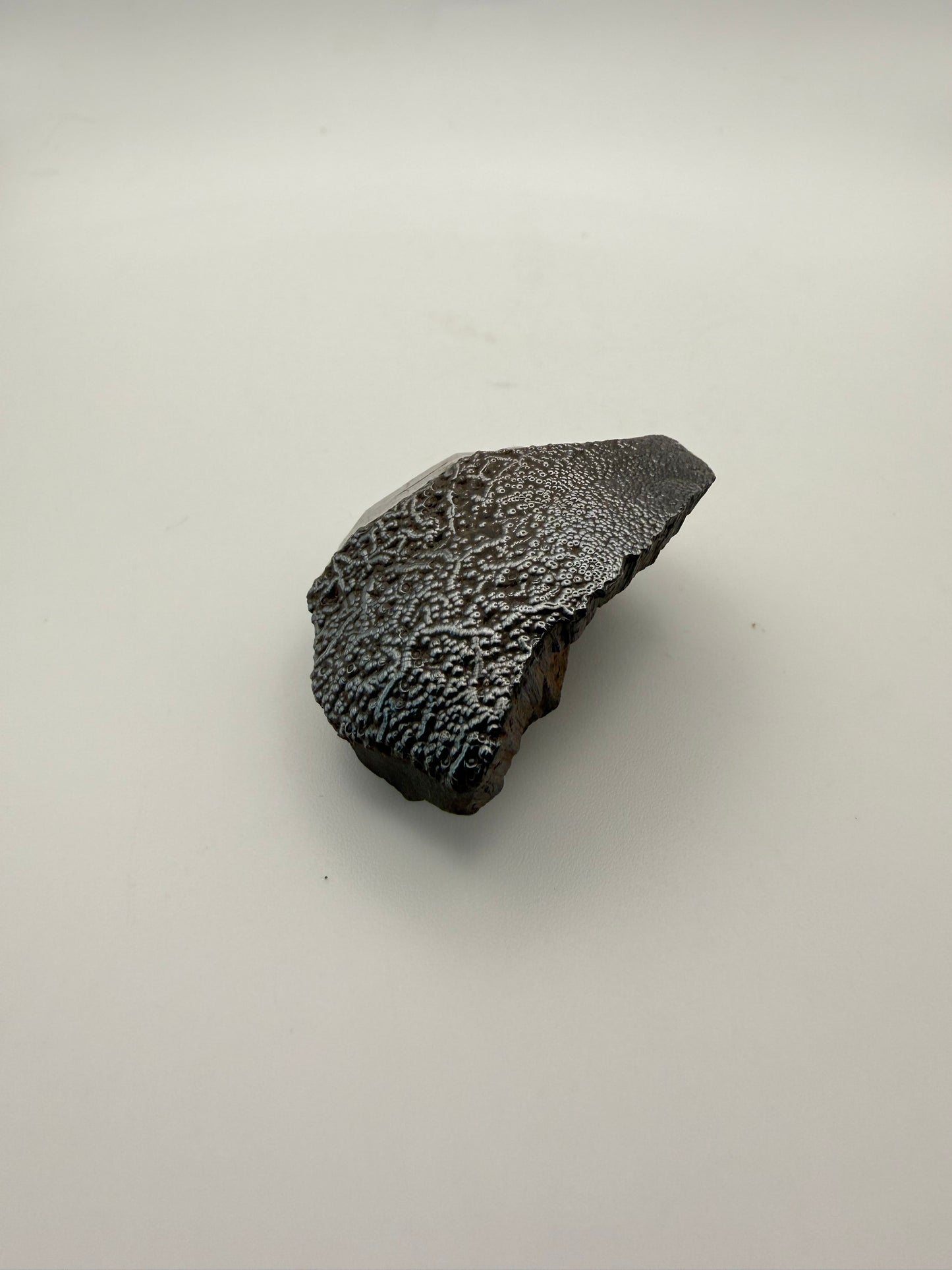 Small raw hematite specimen.