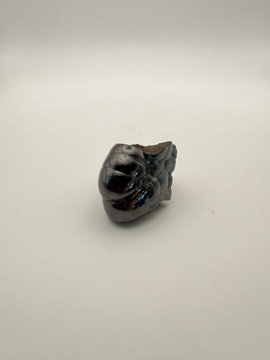 Small raw hematite specimen.