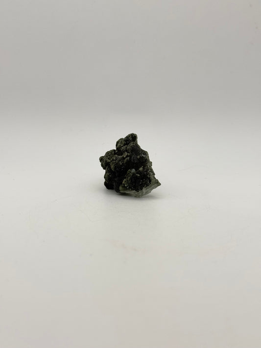 Raw prehnite specimen with amazing green color.