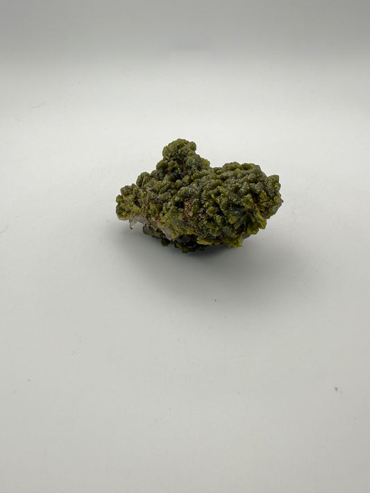 Epidote crystal cluster with good green color.
