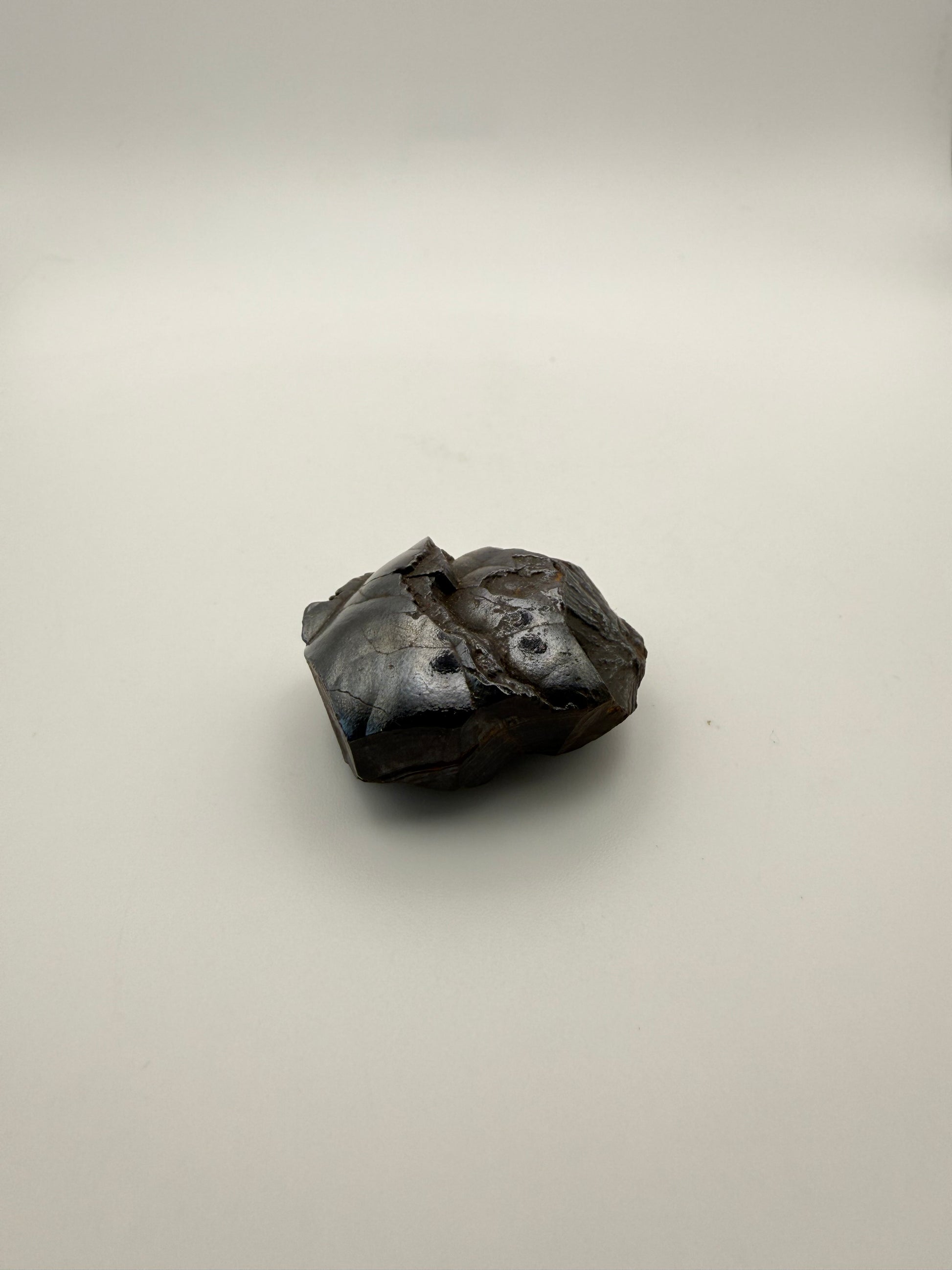 Small raw hematite specimen.