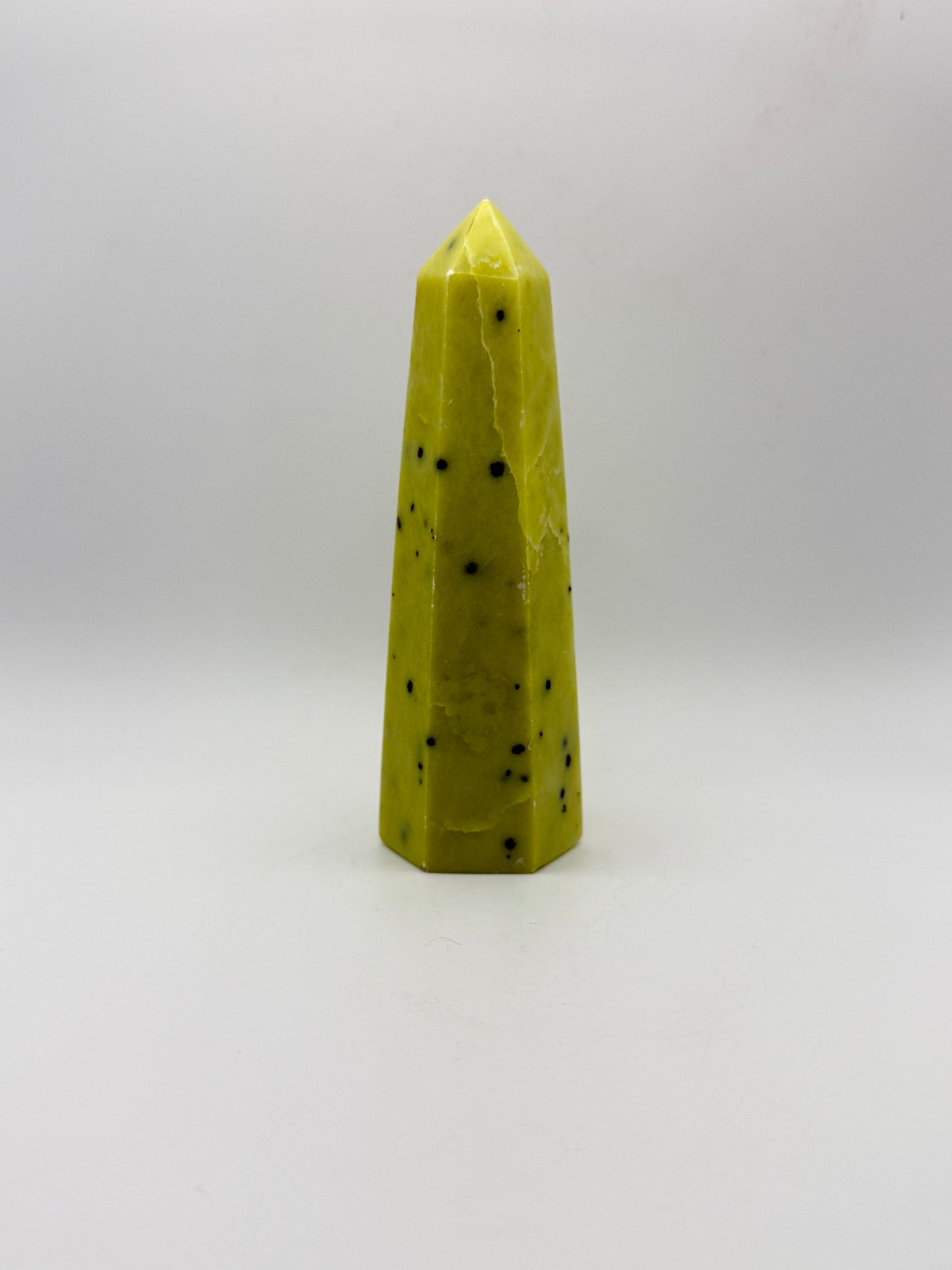 Polished healerite six sided tower.