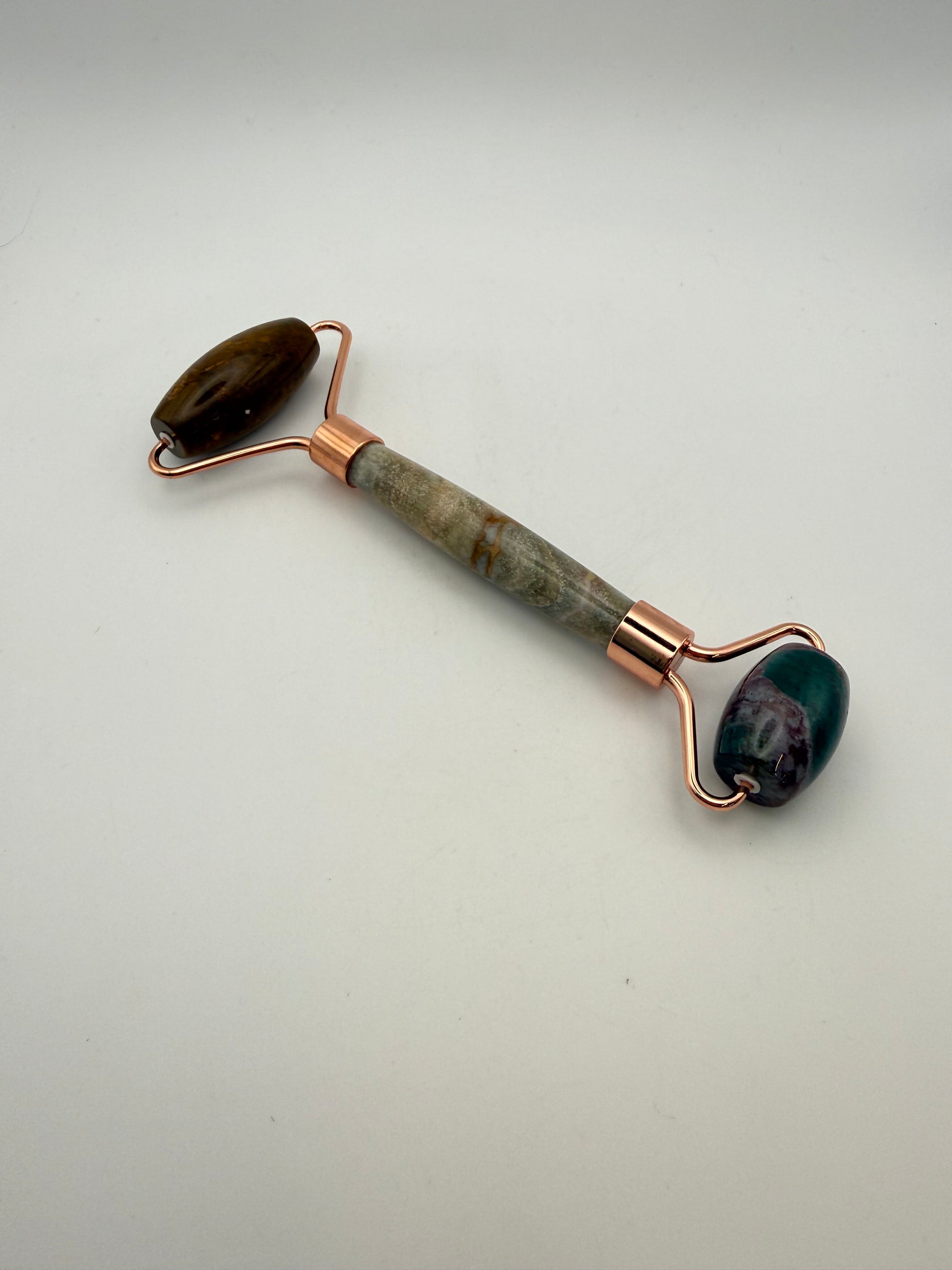 Massage roller made from ocean jasper stone.