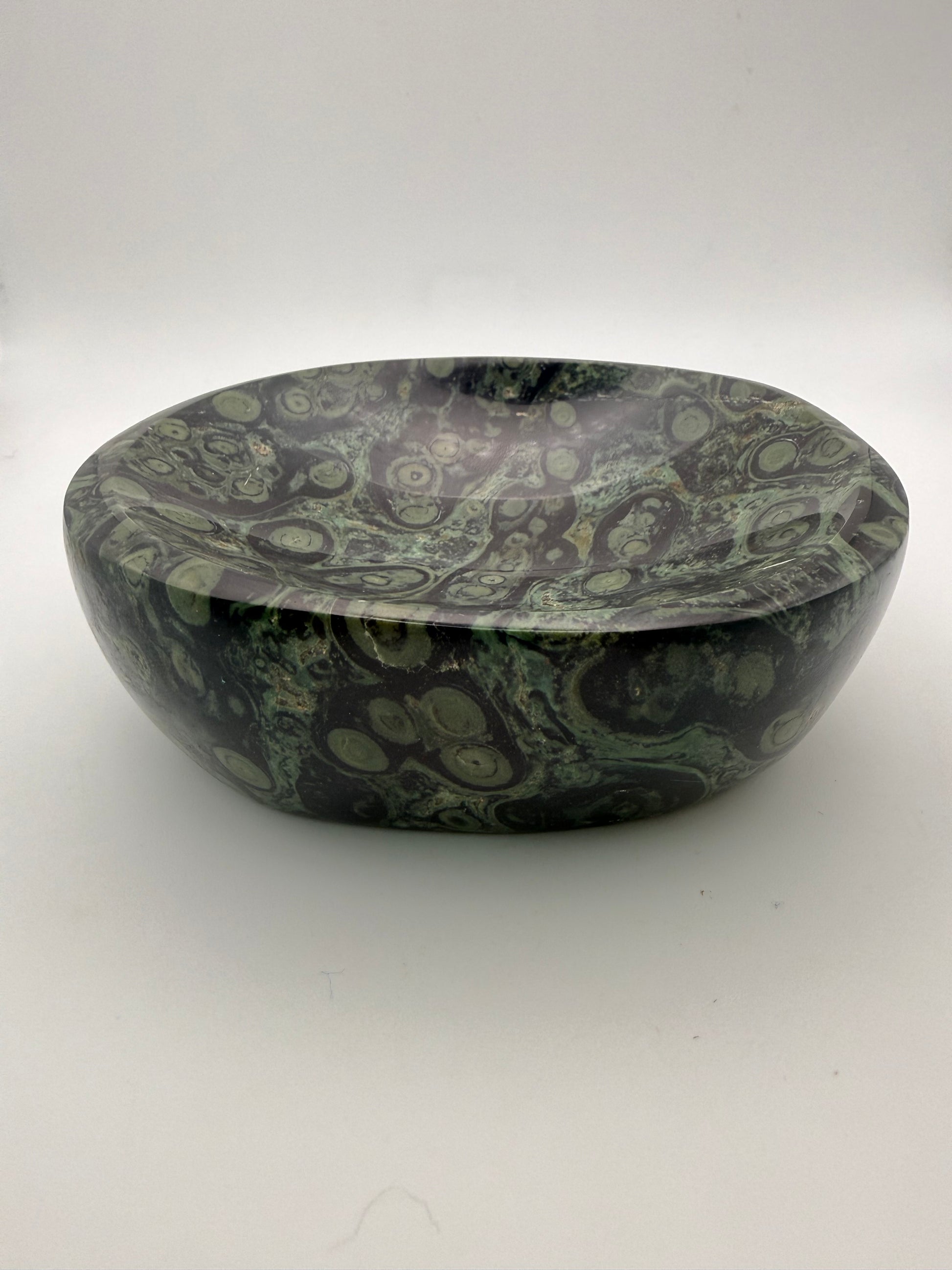 Polished kambaba jasper in the shape of a bowl.