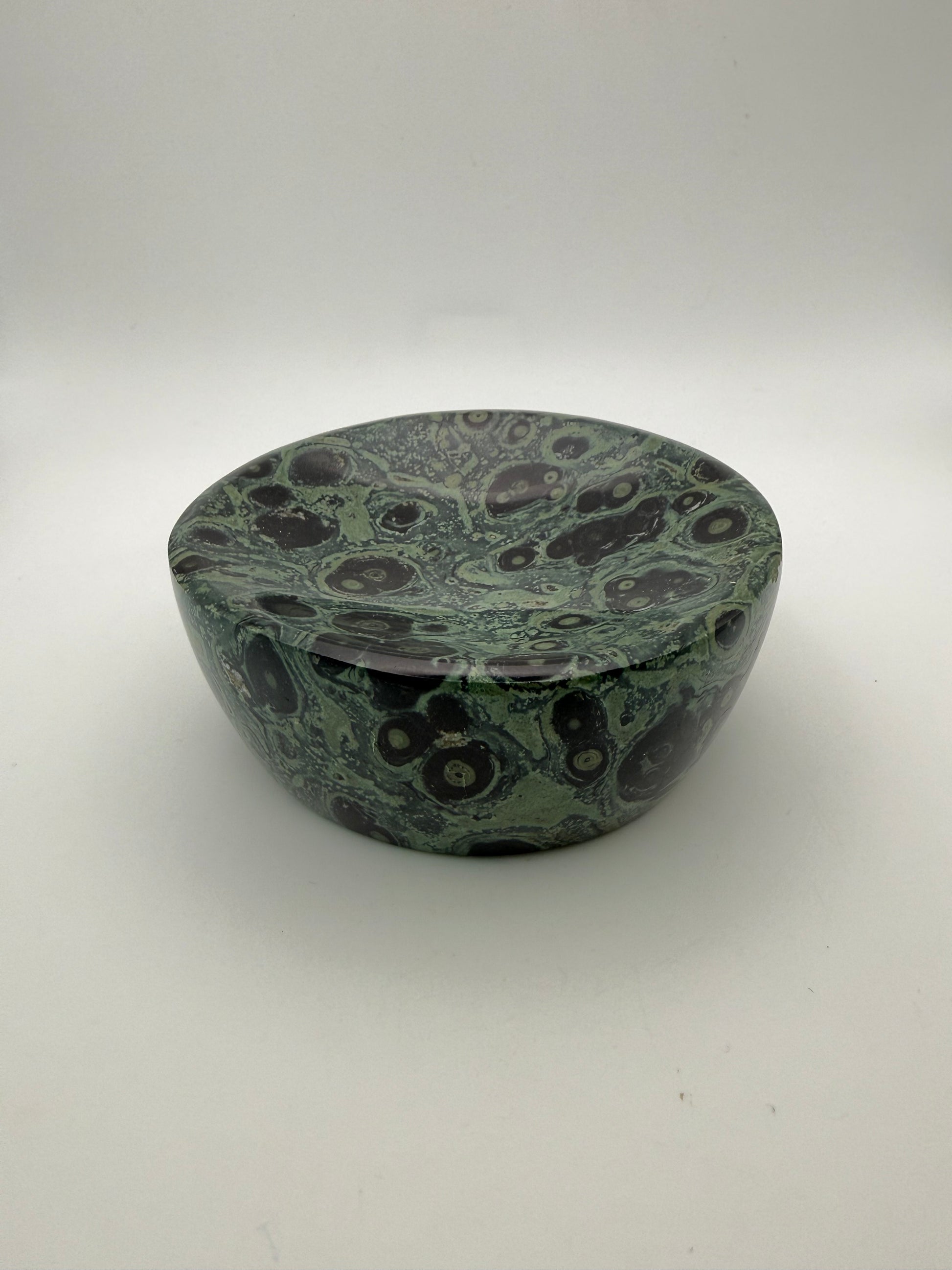 Polished kambaba jasper in the shape of a bowl.