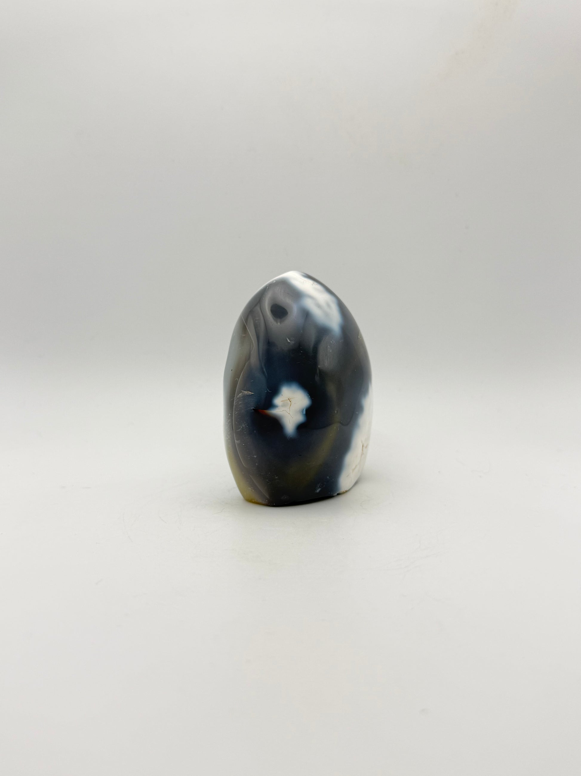 Polished orca agate free form.