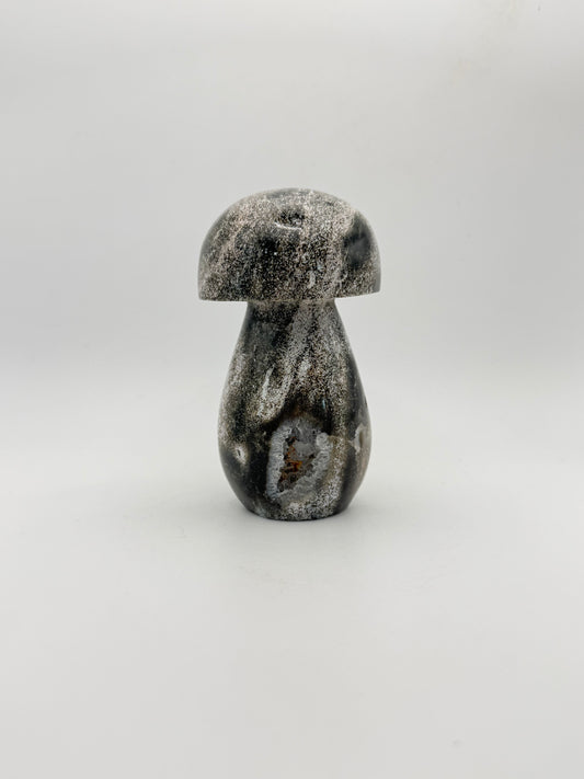 Ocean jasper stone in the shape of a mushroom.