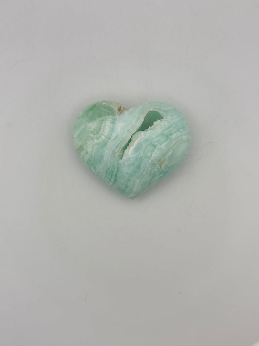 Caribbean Calcite polished crystal in the shape of a heart.
