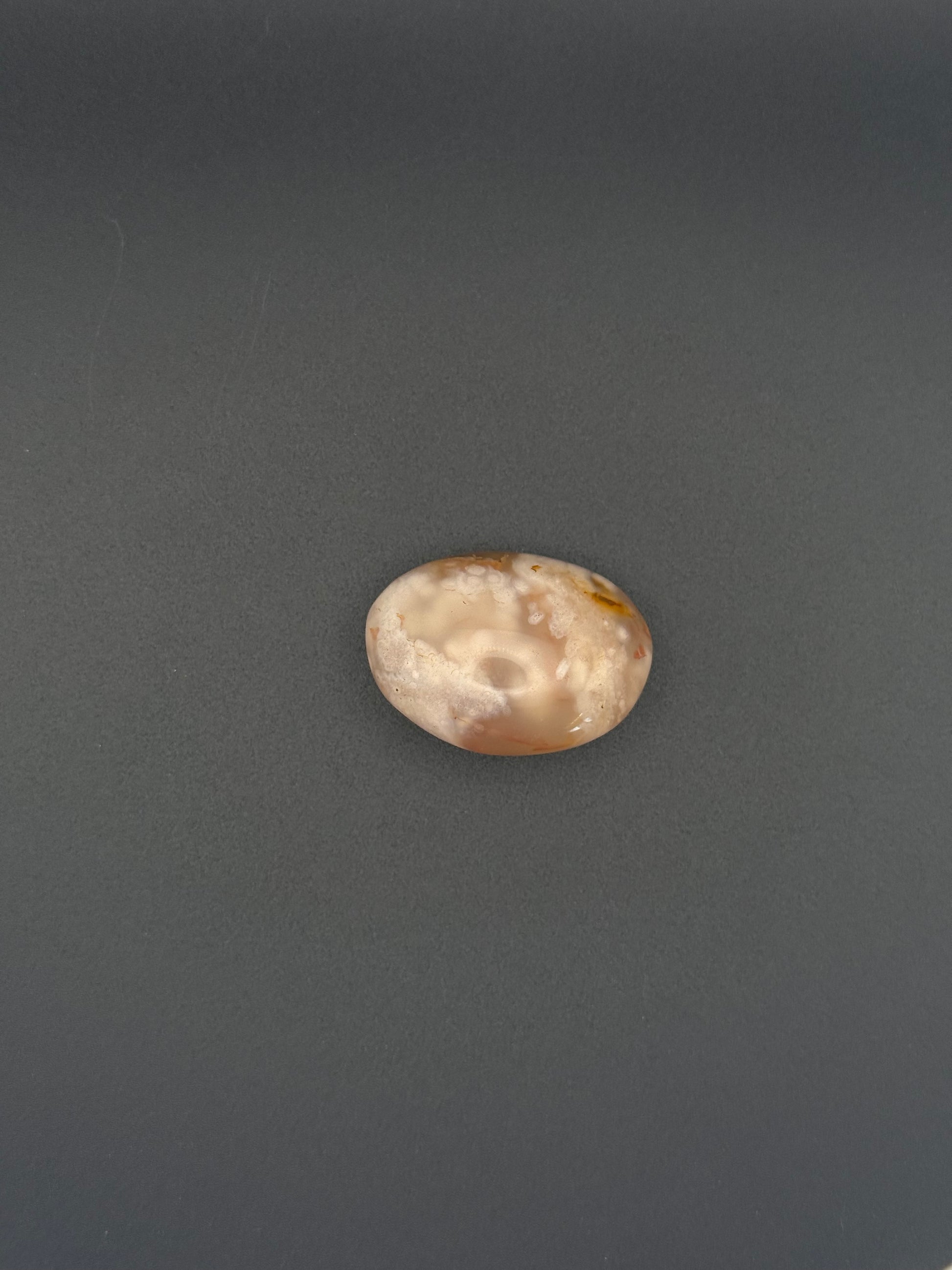 Flower agate polished crystal palm stone.