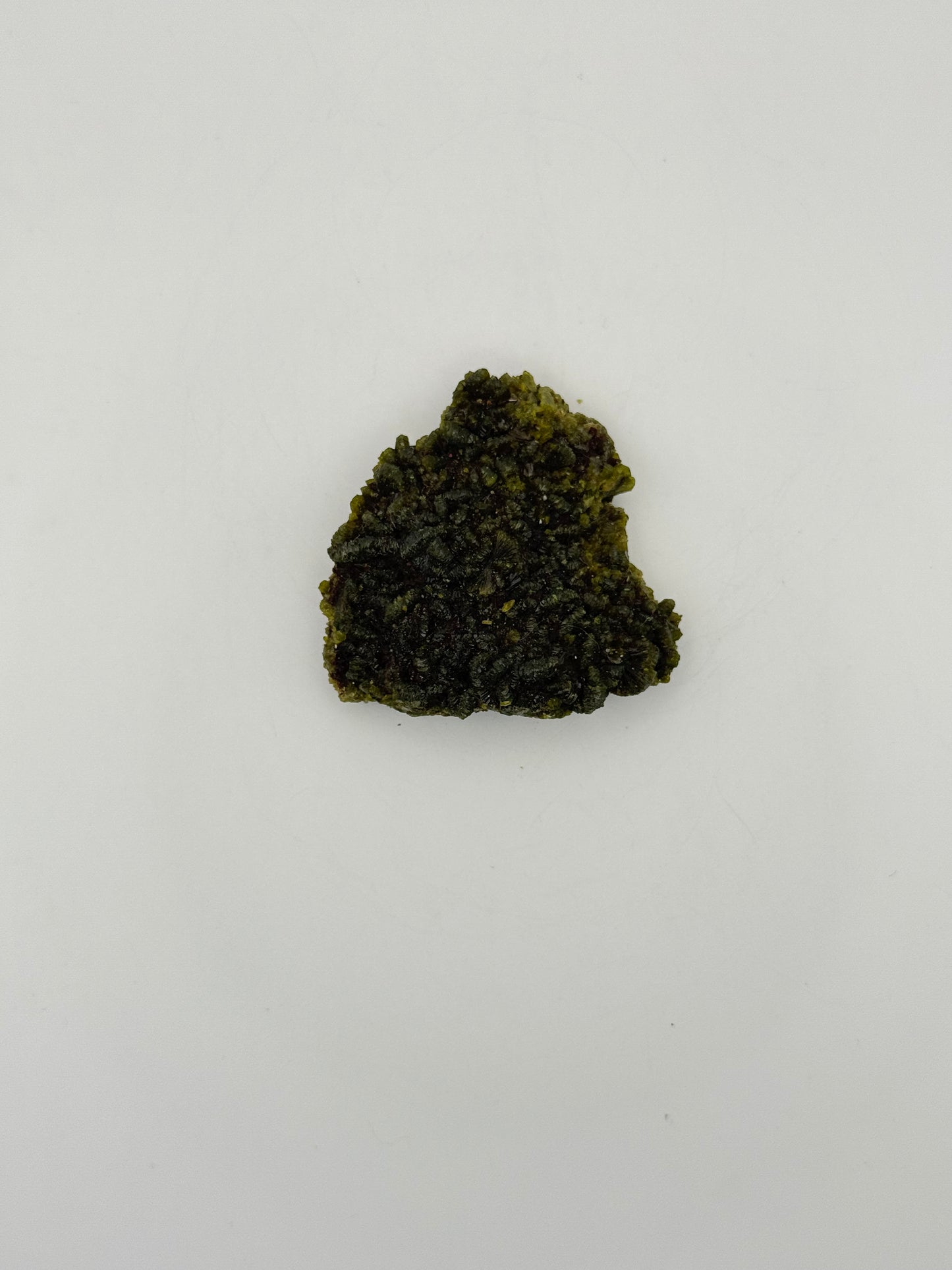 Epidote crystal cluster with good green color.