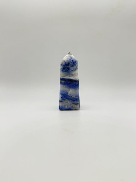 Afghanite four sided tower. Height of 3 1/4 inches, width of 1 1/4 inches.